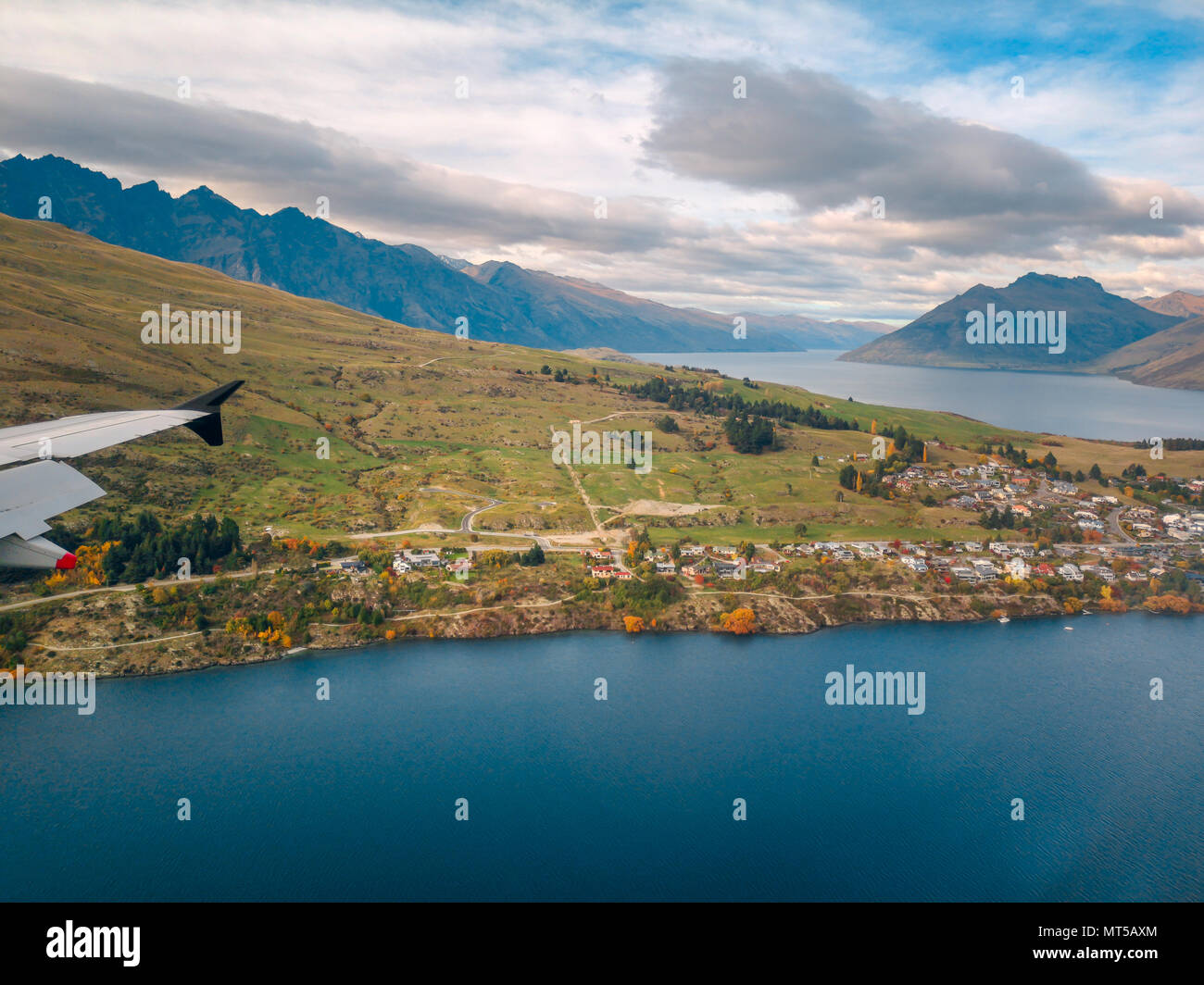 Aerial View from an Airplane Window flying over queenstown New Zealand ...