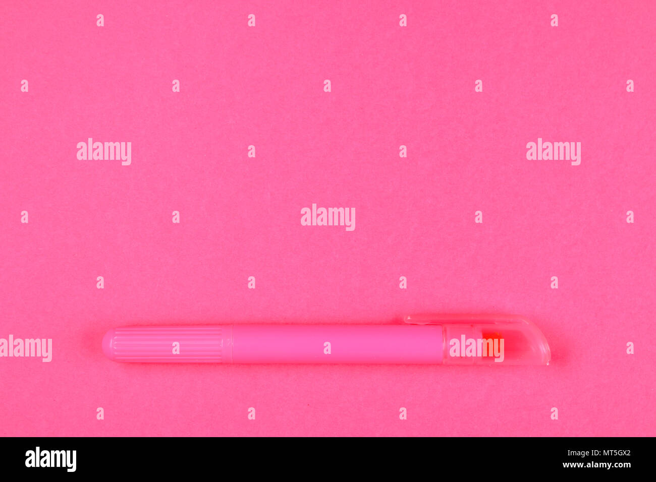 Pink felt-tip pen on a pink pastel background. Summer. Top view. Flat ...