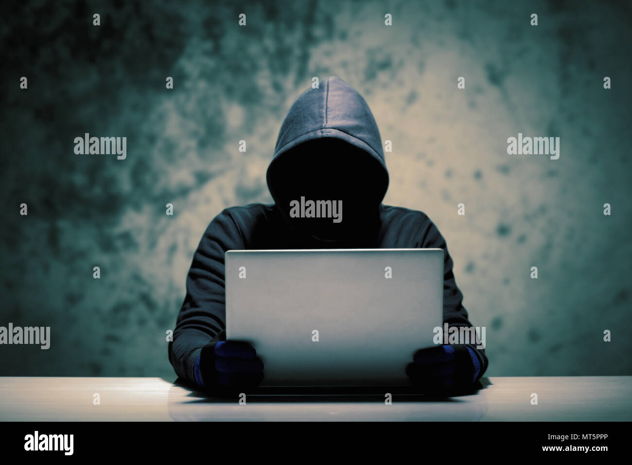 Hackers with computer data theft in the social world. Stock Photo