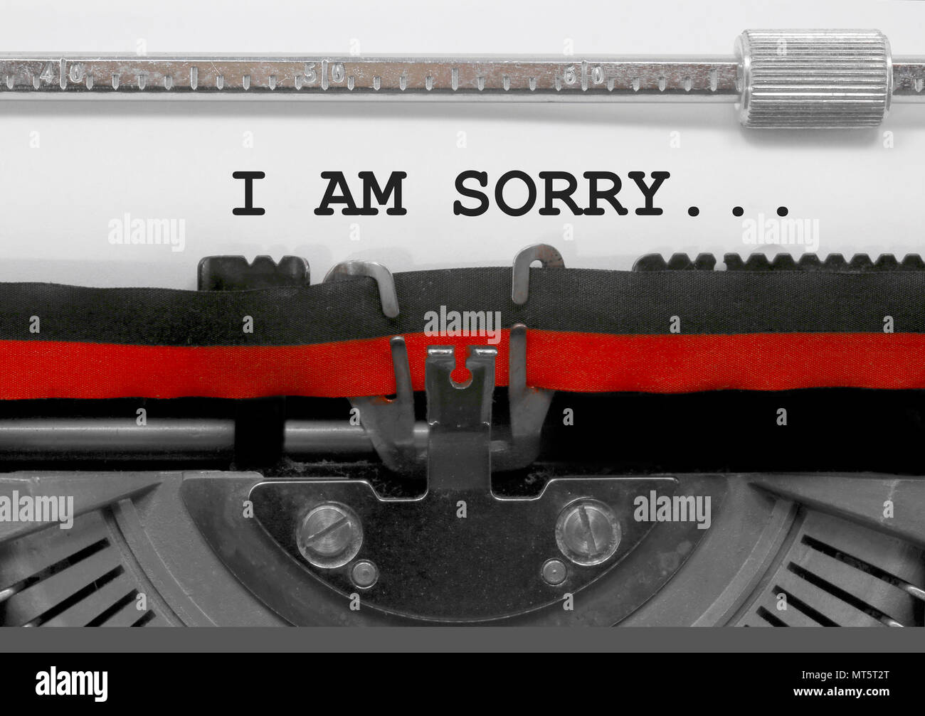 I AM SORRY... text written by an old typewriter on white sheet Stock Photo
