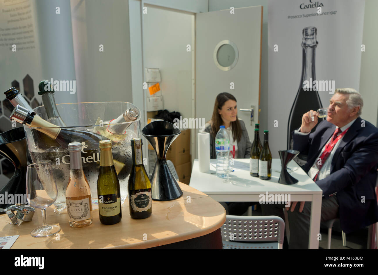 Visitors and traders tasting wine at the London Wine Fair 2018, London,England,UK Stock Photo