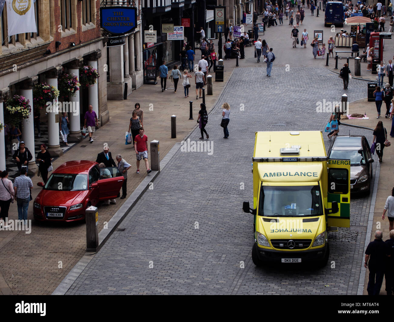 Ambulance in Eastgate street seen from the Eastgate clock in Chester, England, UK. Stock Photo