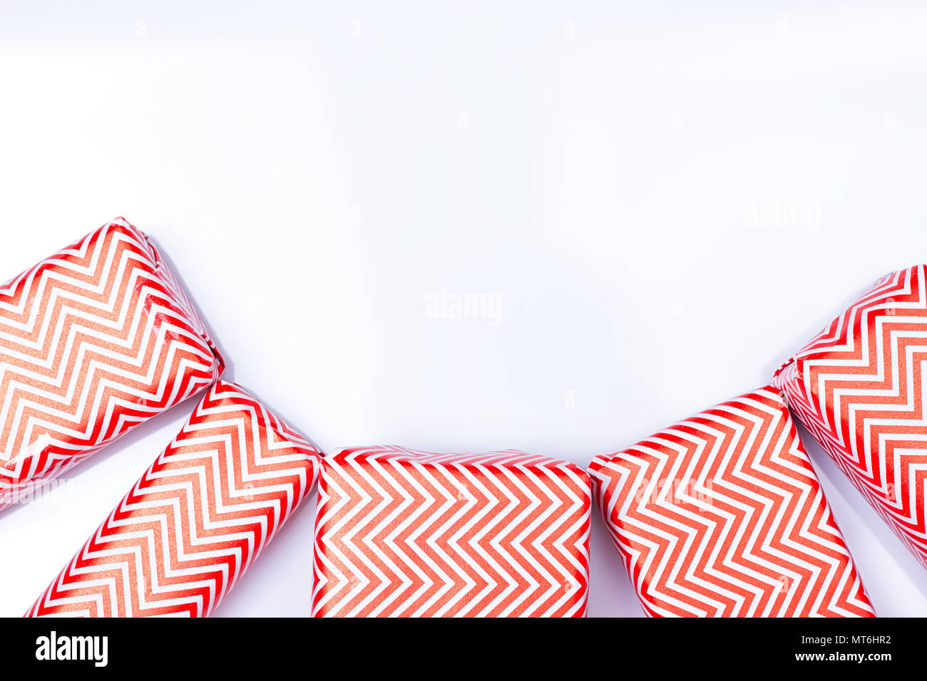 red gift box on the white background Stock Photo - Alamy