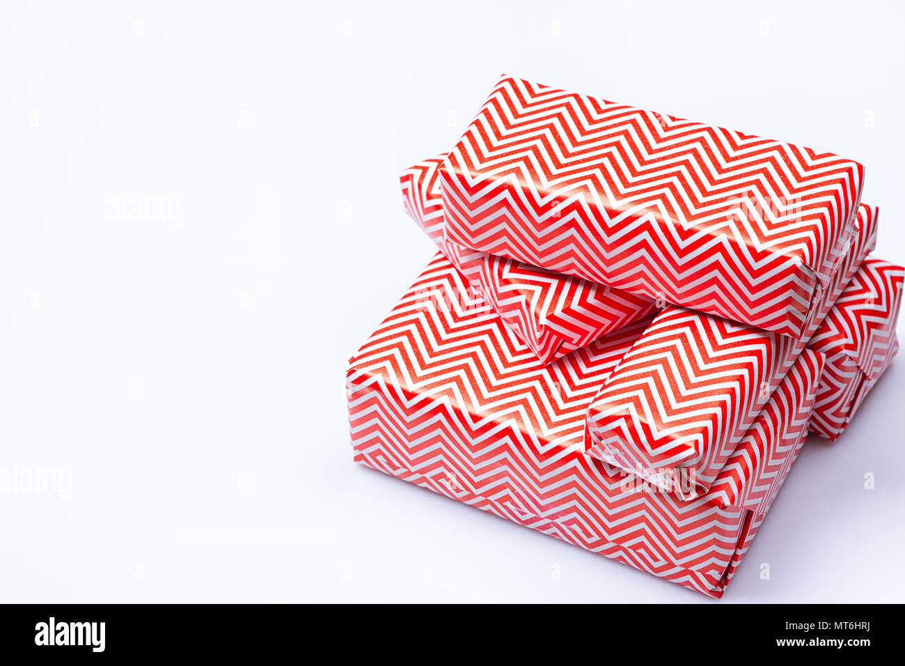 red gift box on the white background Stock Photo - Alamy