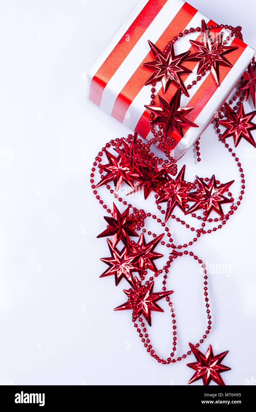red gift box on the white background Stock Photo - Alamy