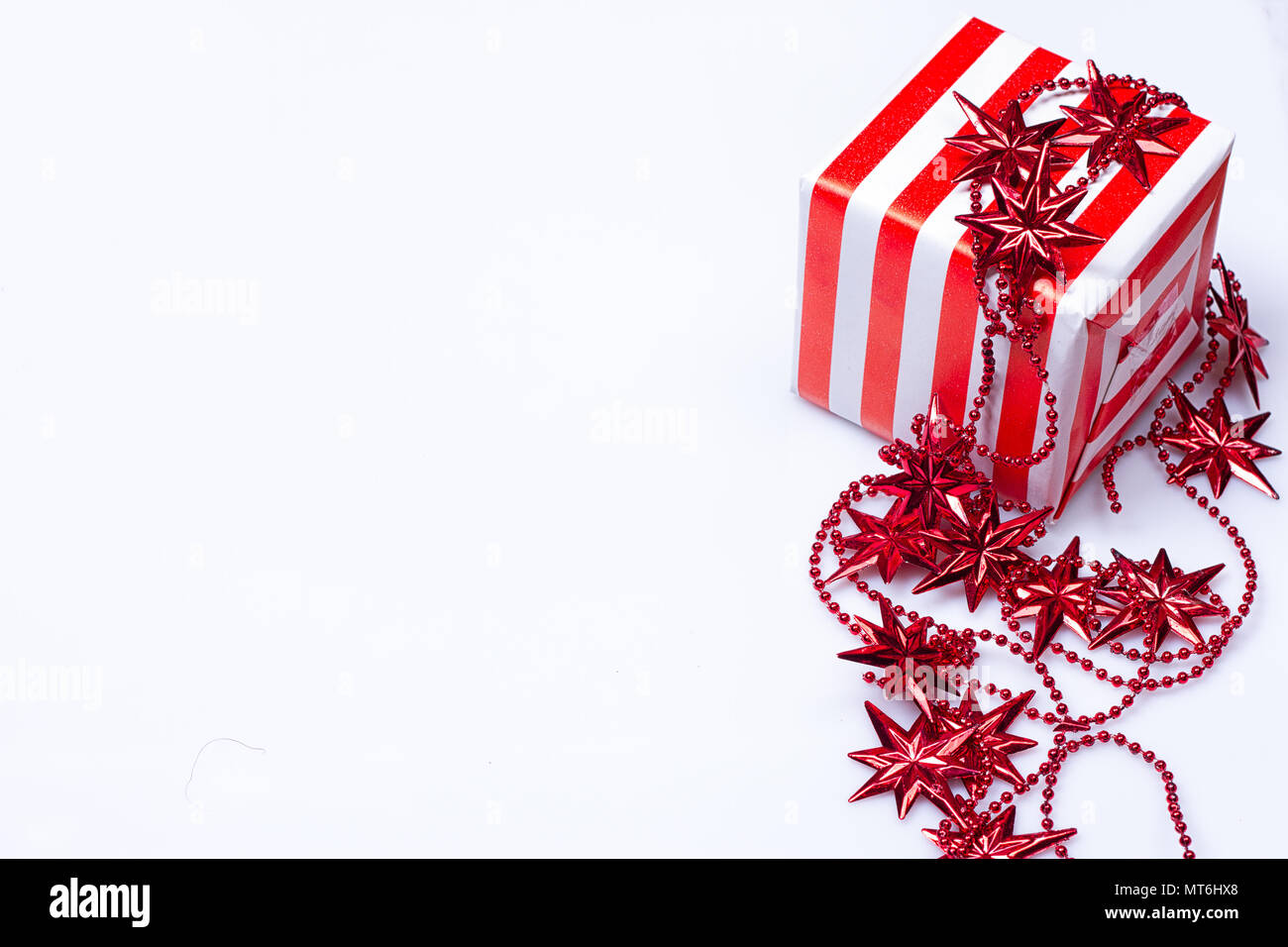 red gift box on the white background Stock Photo - Alamy