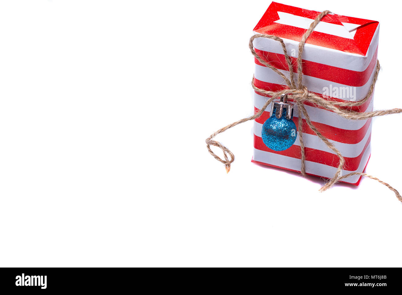 red gift box on the white background Stock Photo - Alamy