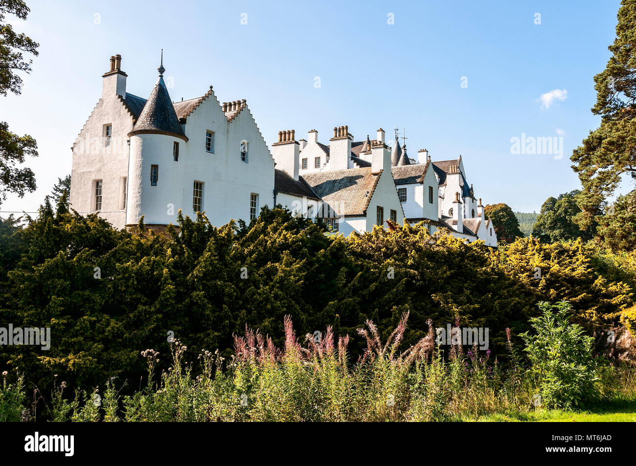 The magnificent white grade A listed building of Blair Castle with its towers and angled turrets being the ancestral home of the Clan Murray Stock Photo