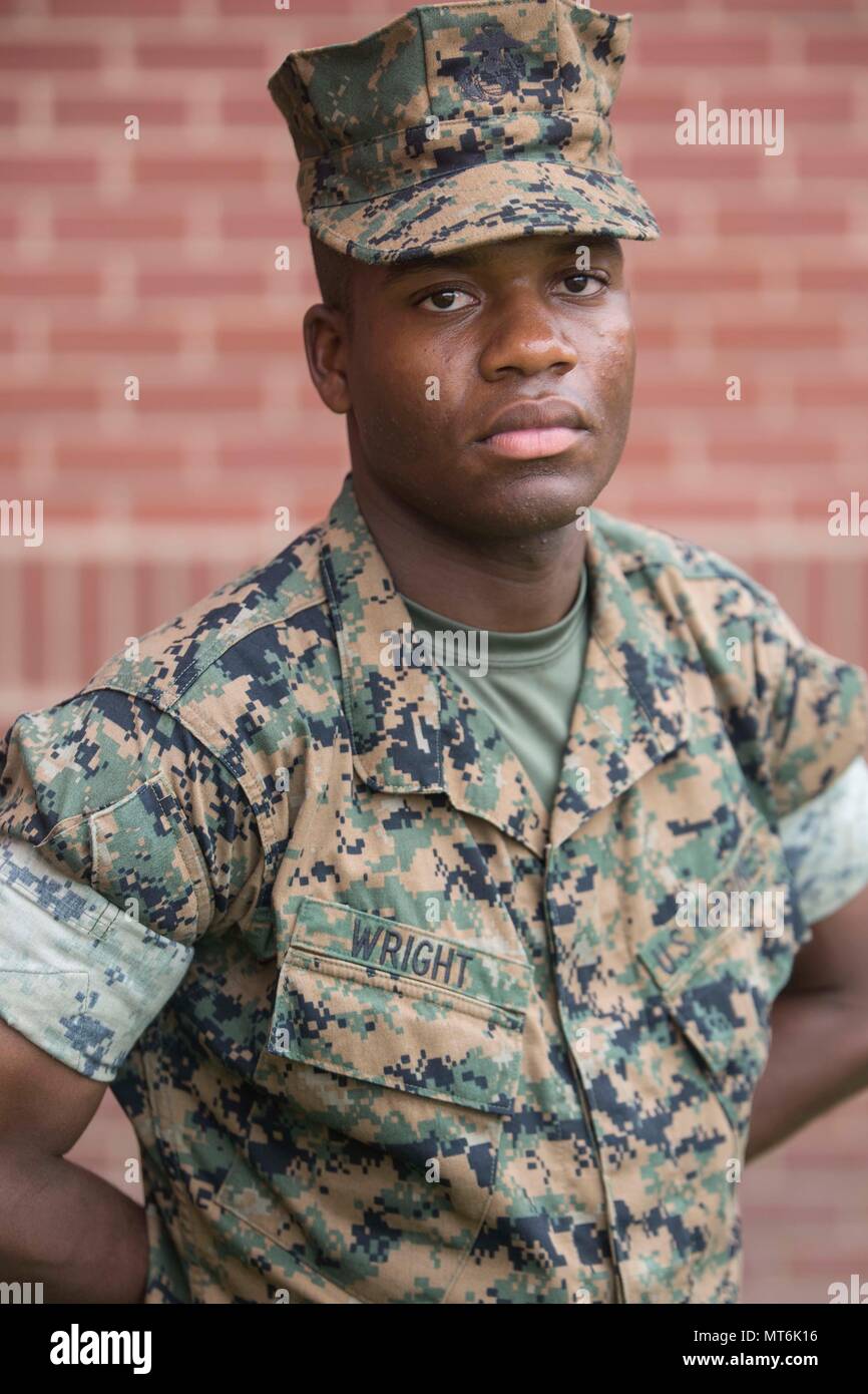 Pvt. Jermaine W. Wright, Platoon 3052, Mike Company, 3rd Recruit Training Battalion, earned U.S. citizenship July 27, 2017, on Parris Island, S.C. Before earning citizenship, applicants must demonstrate knowledge of the English language and American government, show good moral character and take the Oath of Allegiance to the U.S. Constitution. Wright, from Queens, N.Y., originally from Jamaica, is scheduled to graduate July 28, 2017. (Photo by Lance Cpl. Maximiliano Bavastro) Stock Photo