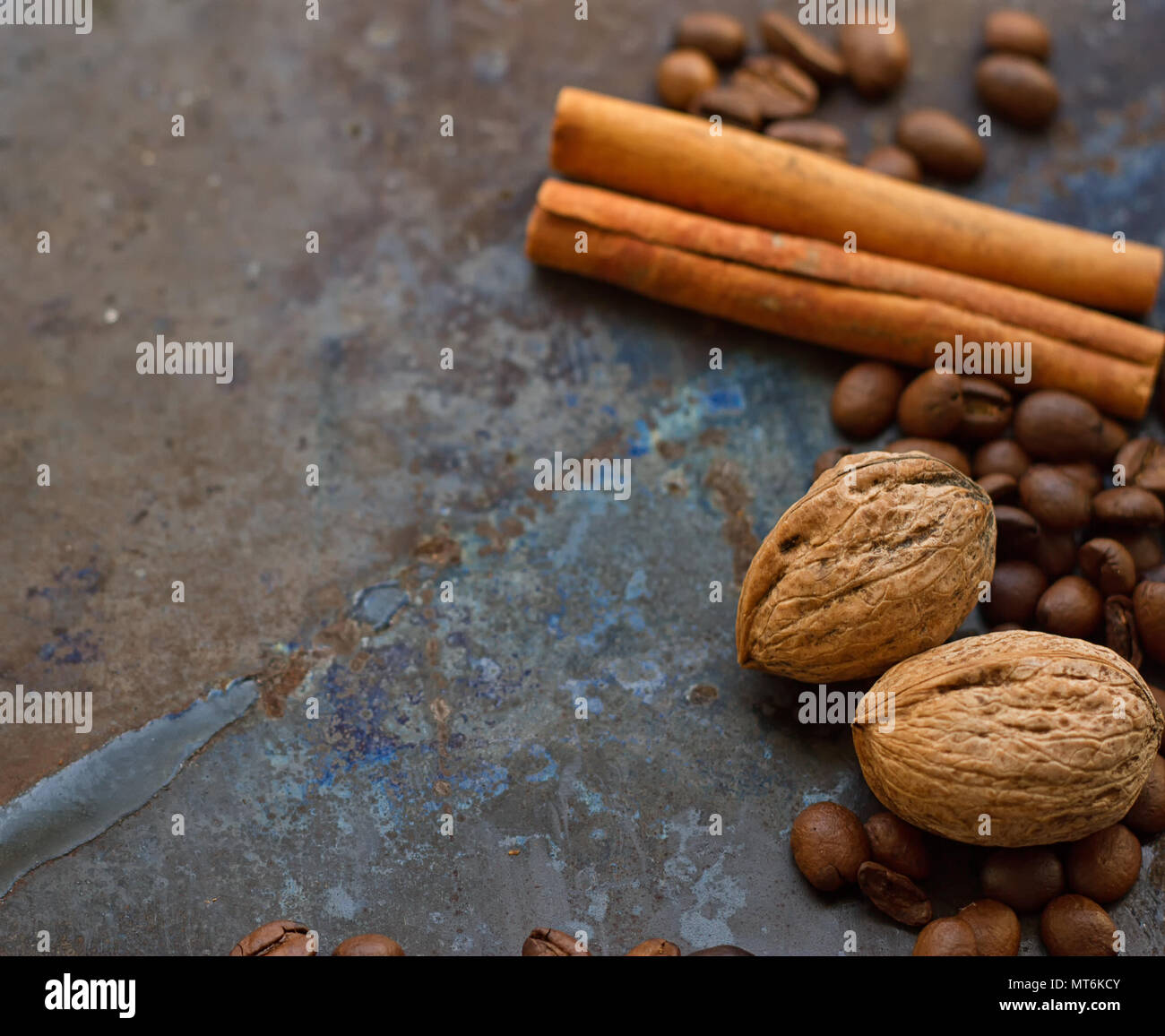 coffee beans nuts cinnamon stick on grunge background Stock Photo