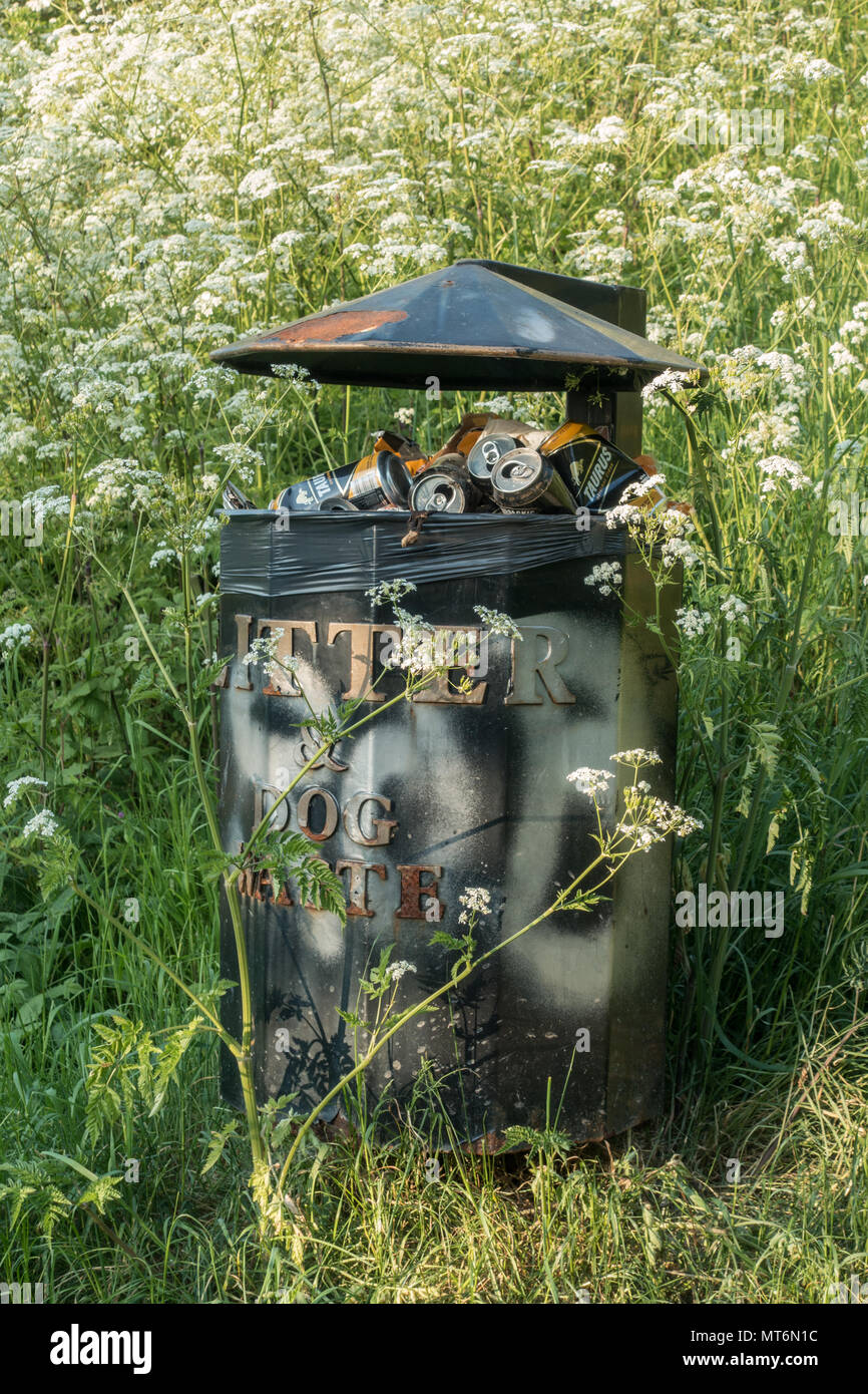 A bin full of rubbish in the English countryside Stock Photo Alamy