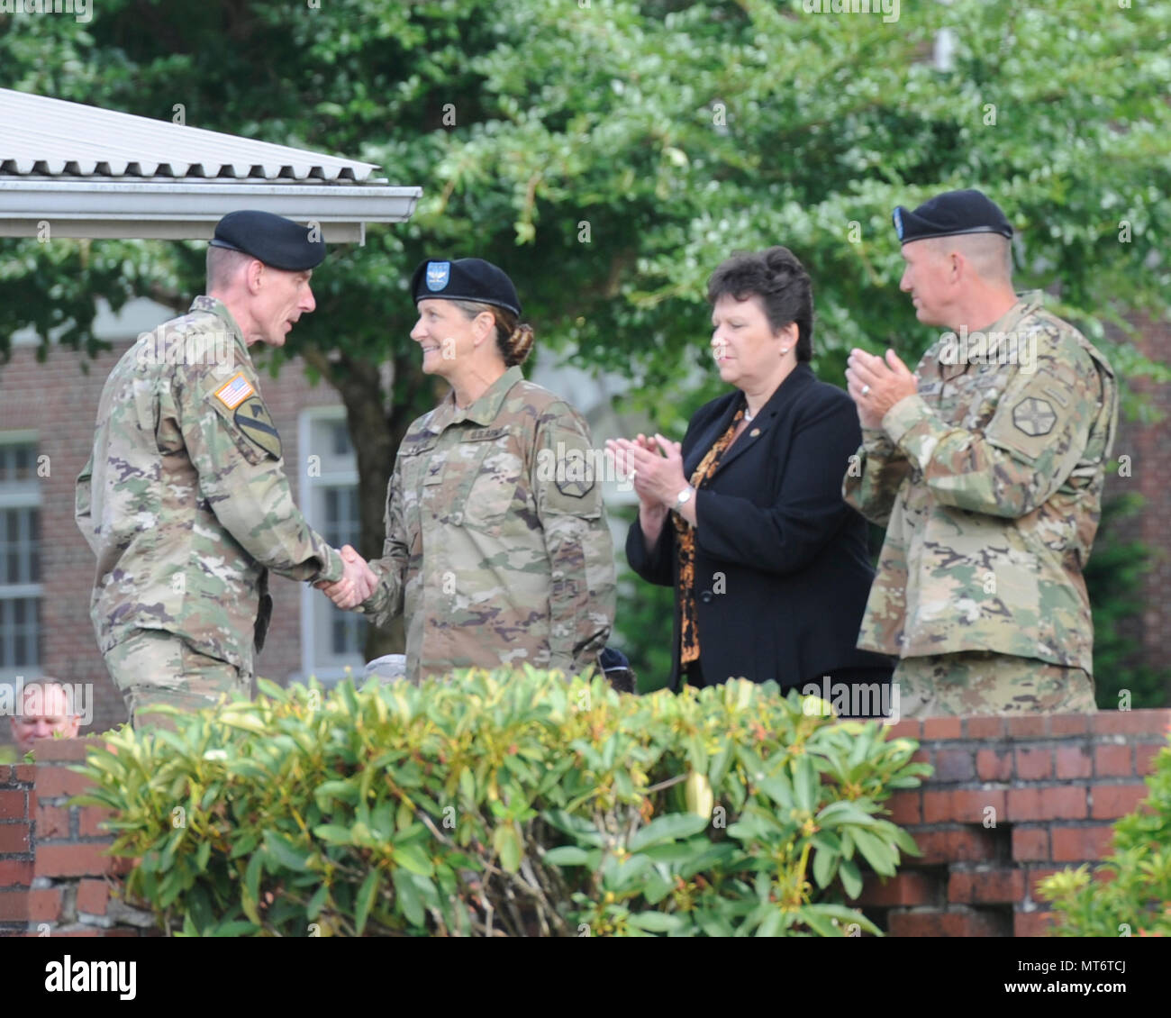 Colonel Daniel S. Morgan relinquishing Garrison Command of Joint Base Lewis-McChord to Colonel Nicole M. Lucas, at the 28 July 2017 Change Of Command on Watkins Field, JBLM Lewis Main. Director of Installation Management Command (IMCOM) is Brenda Lee McCullough. Lt. Gen. Gary Volesky Commander of I Corps photographed. Stock Photo