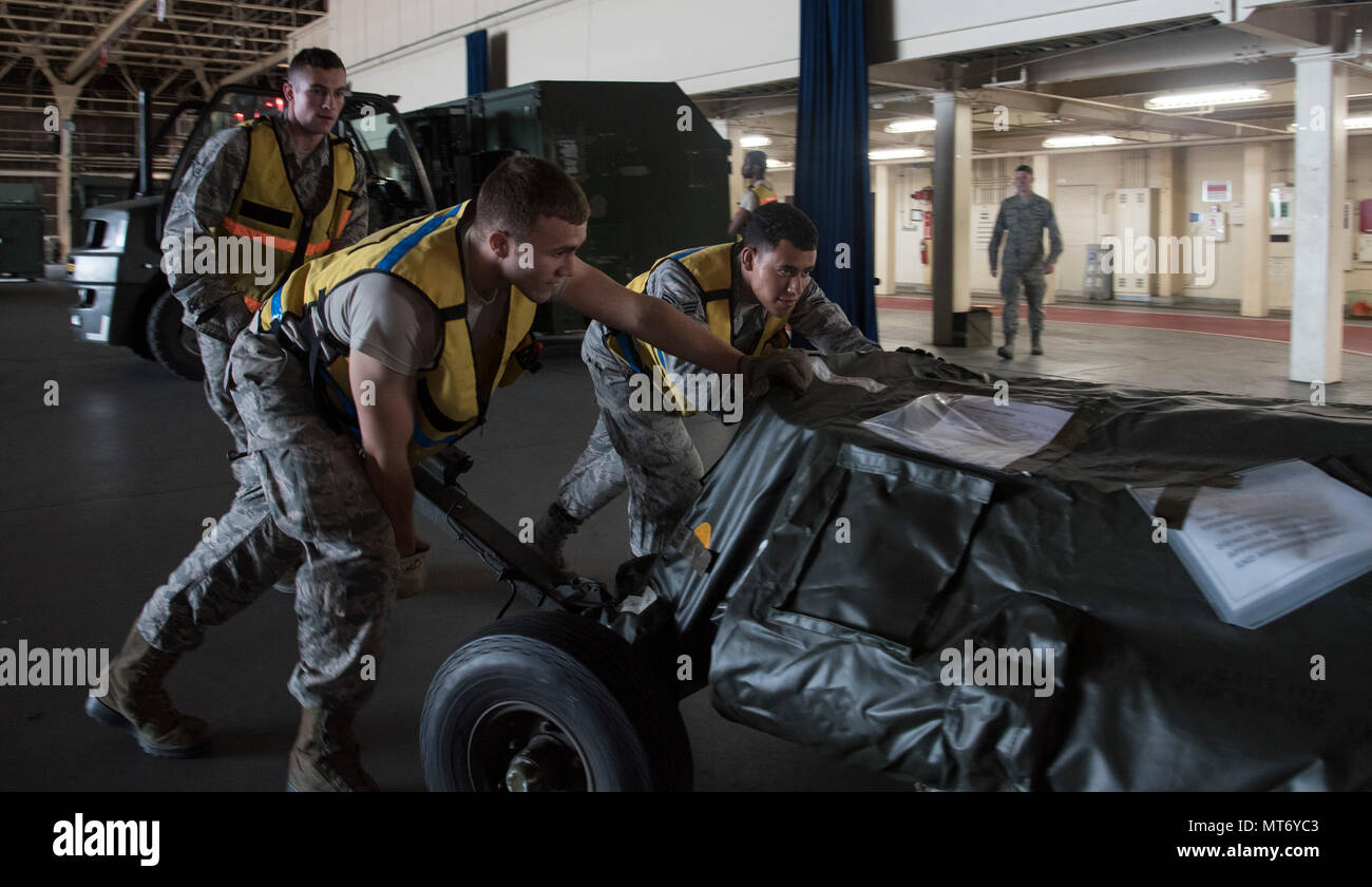 U S Air Force 35th Logistics Readiness Squadron Augmentees Push An Aircraft Part Into A Storage Area During Exercise Beverly Sunrise 17 07 At Misawa Air Base Japan Sept 16 2017 Within Their Inbound