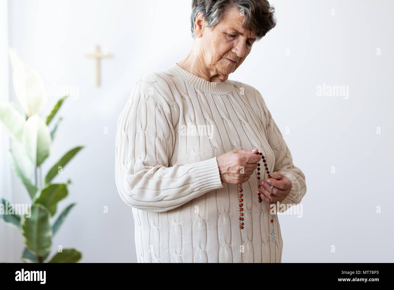 An old woman with a rosary hi-res stock photography and images - Alamy