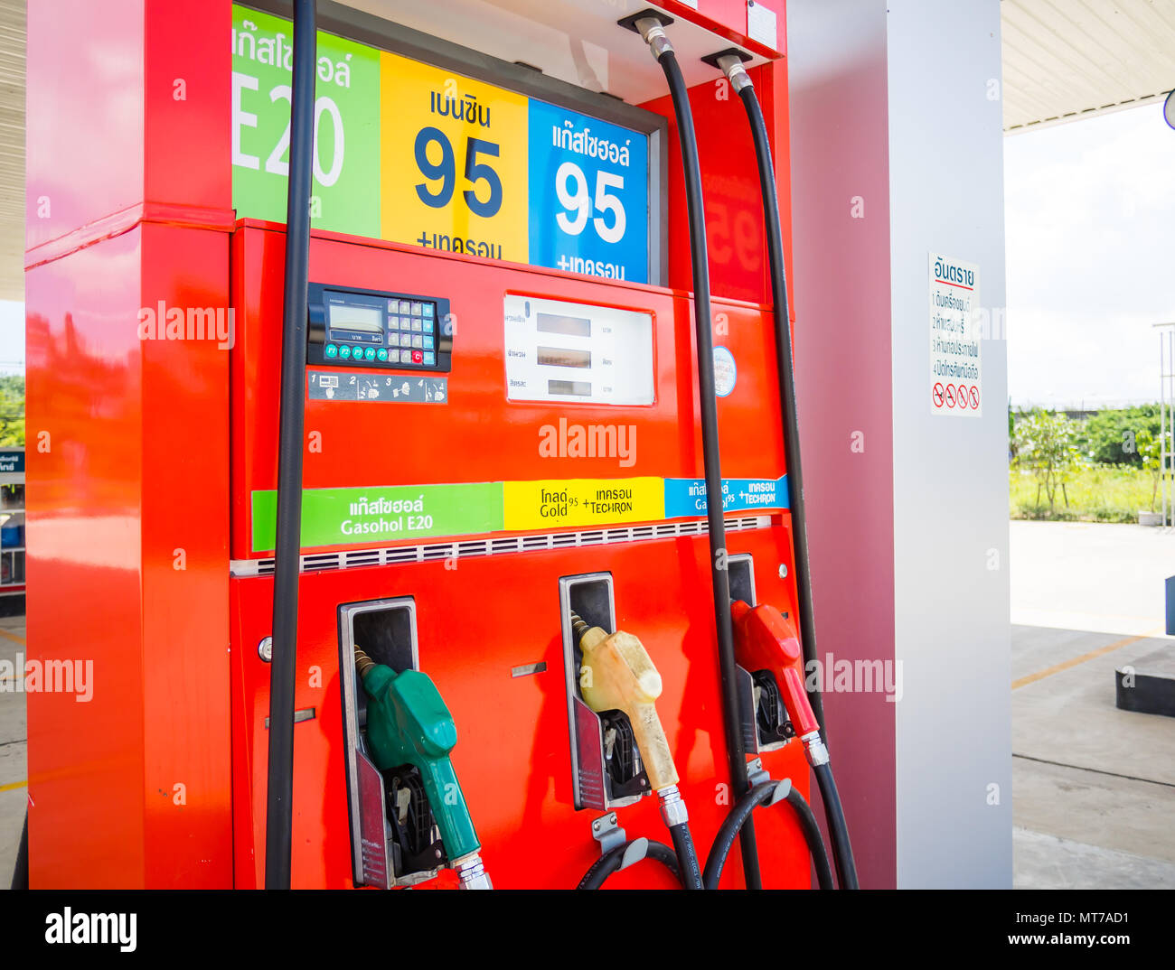 Trang, Thailand September 2, 2017 Caltex gas station blue sky