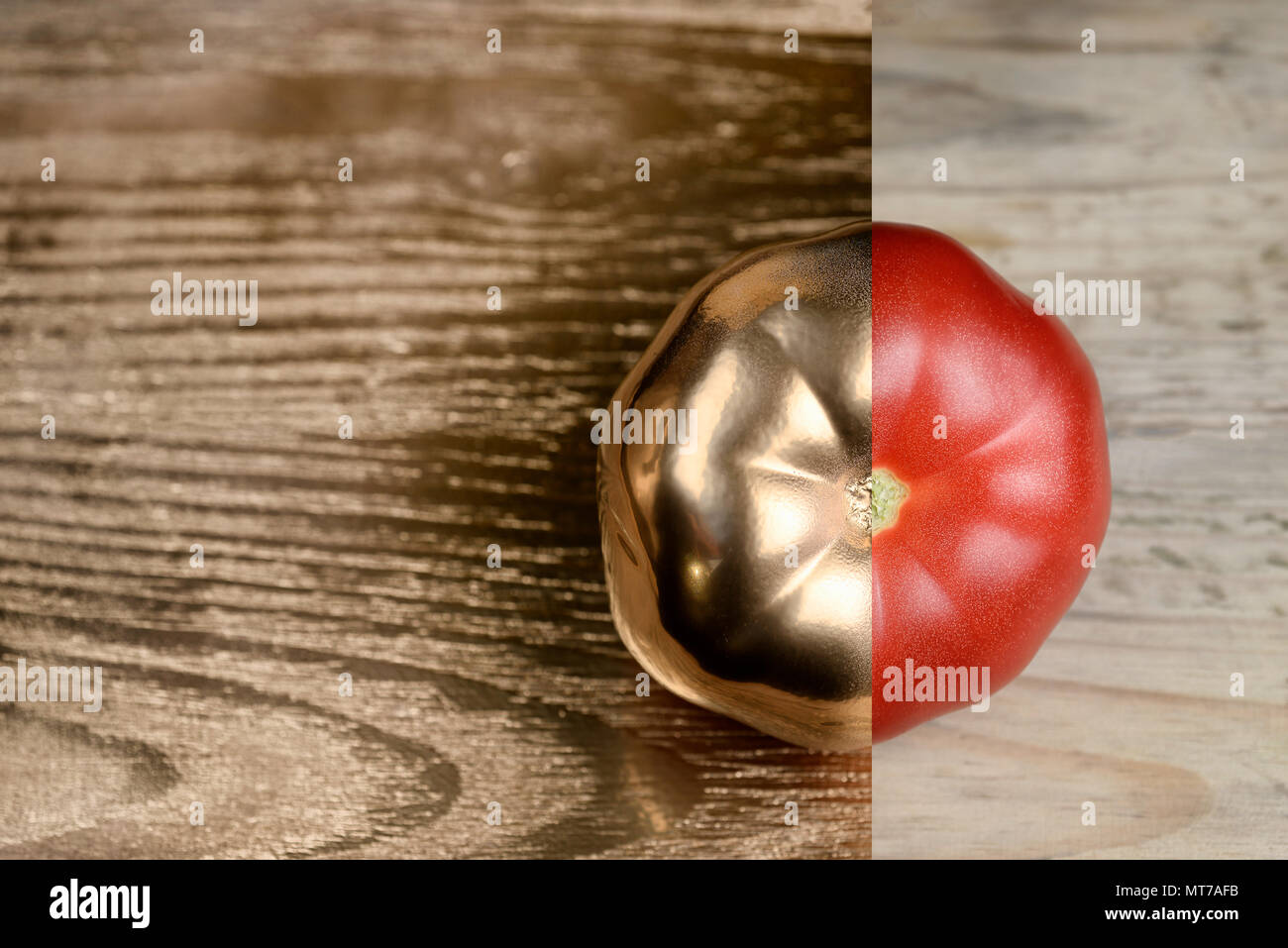 Creative layout made of tomato. Golden paint and natural. Food concept. Stock Photo