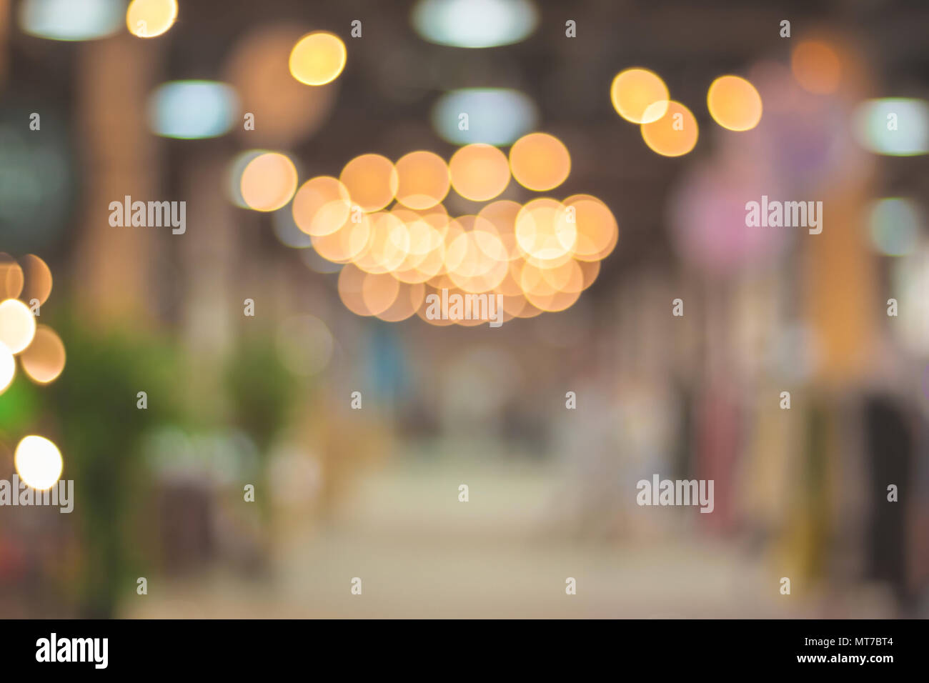 Inside the shopping mall. Store bokeh background Stock Photo - Alamy