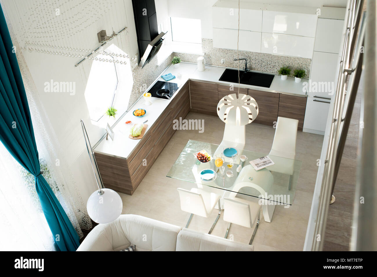 Comfortable contemporary kitchen and dining area Stock Photo