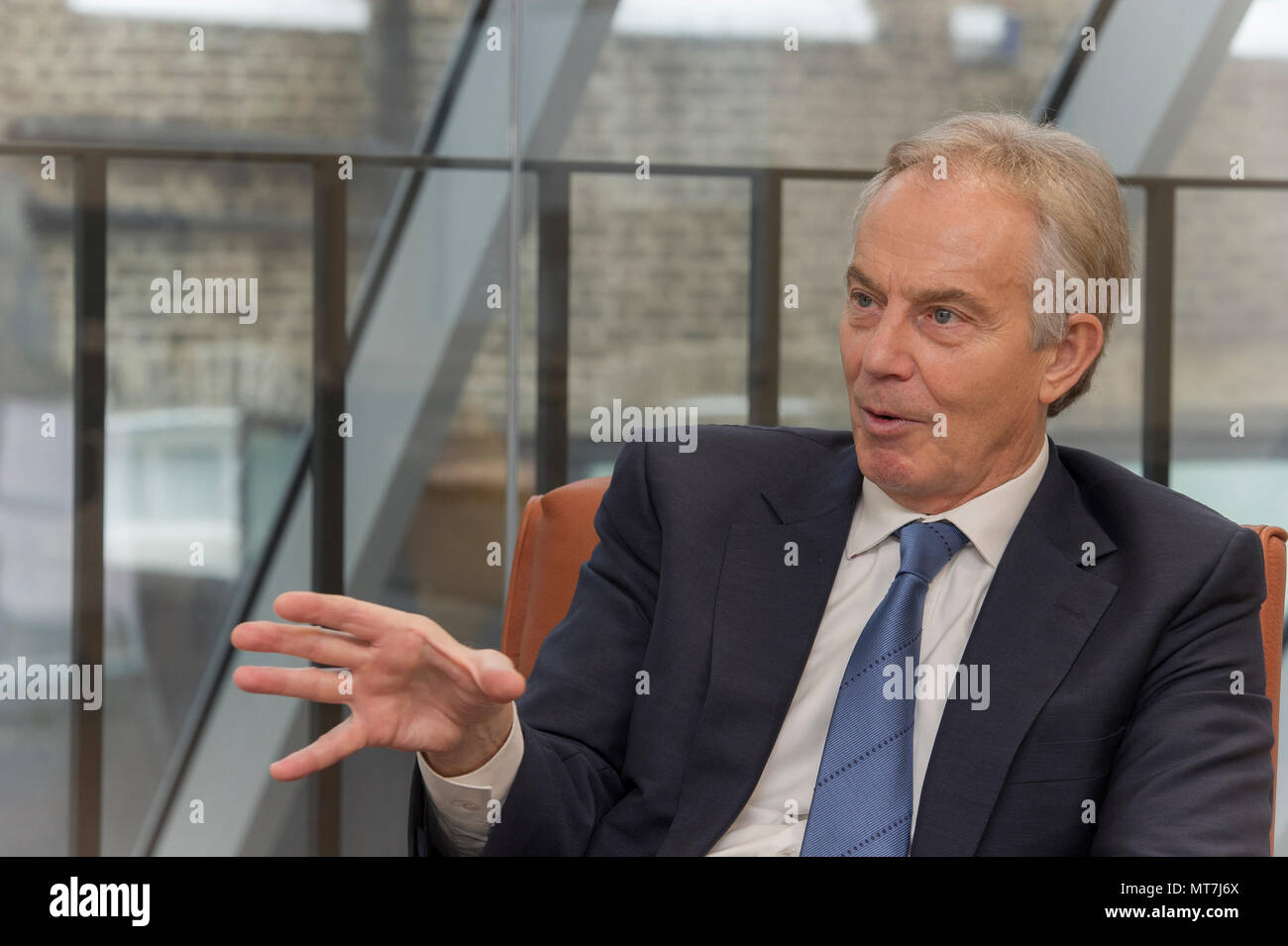 The Right Honourable Tony Blair in conversation in his office at the