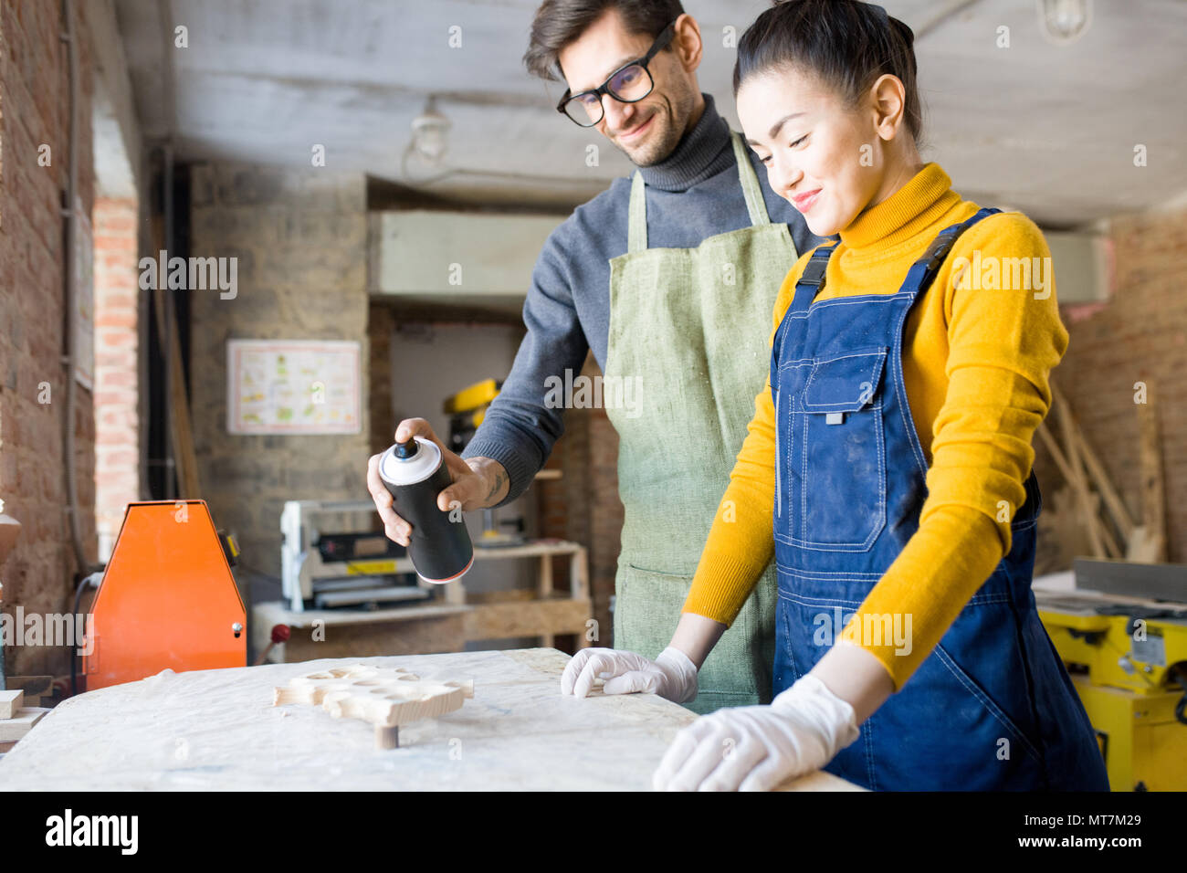 Two artists Doing Creative Woodwork Stock Photo