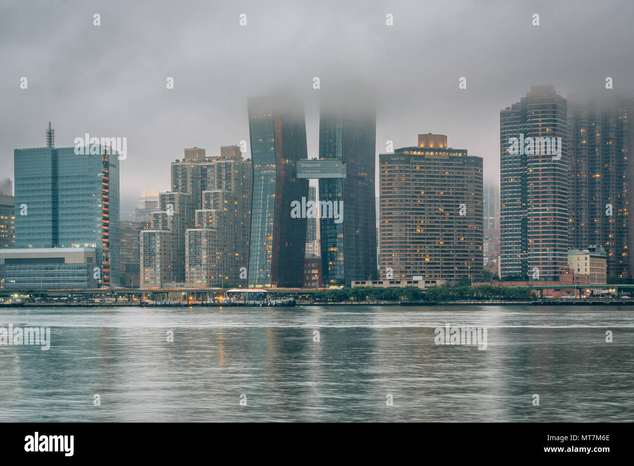 Foggy view of the Manhattan skyline from Gantry Plaza State Park, in Long Island City, Queens, New York City. Stock Photo