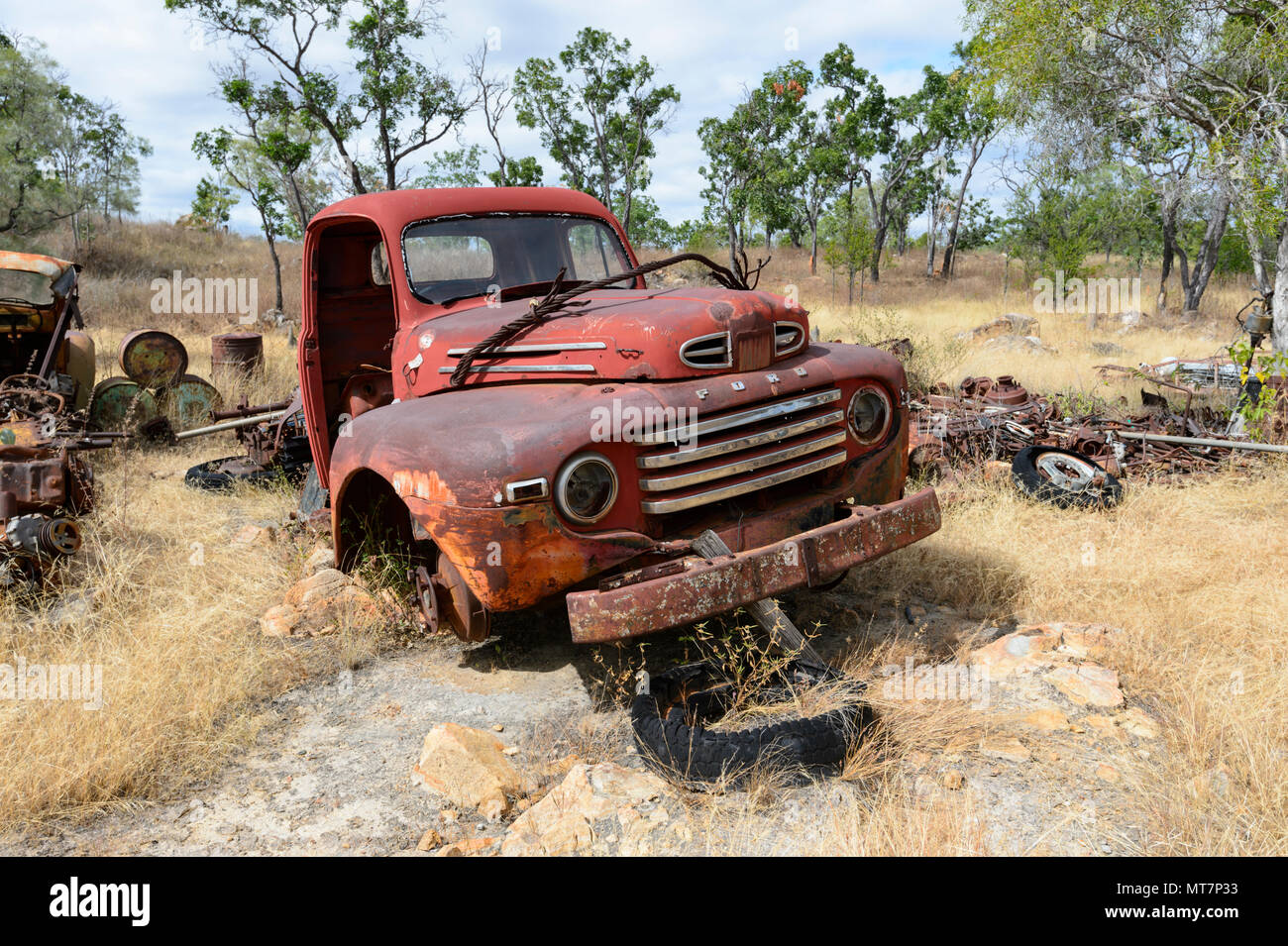 Old rusty red Ford truck, part of Tom Prior's historic Ford collection