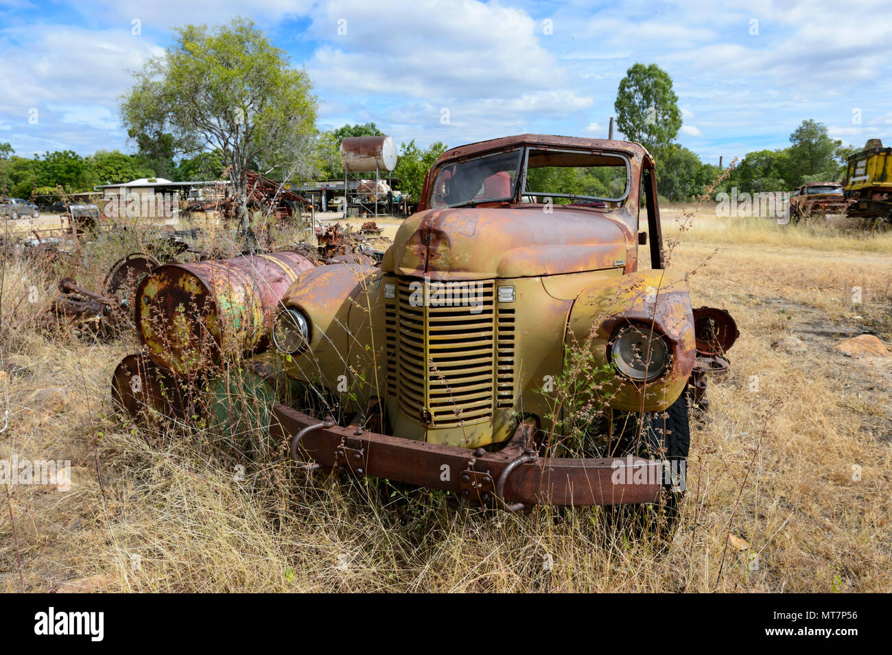 Old rusty yellow International Harvester Ford truck, part of Tom Prior's historic Ford collection, Chillagoe, Far North Queensland, FNQ, QLD, Australi Stock Photo