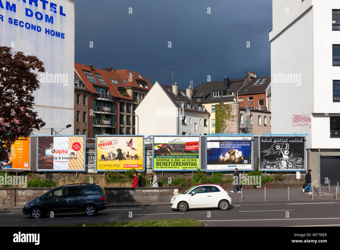 Germany, Cologne, houses and billboards on Maximinen street near main station.  Deutschland, Koeln, Haeuser und Werbeplakate an der Maximinenstrasse n Stock Photo