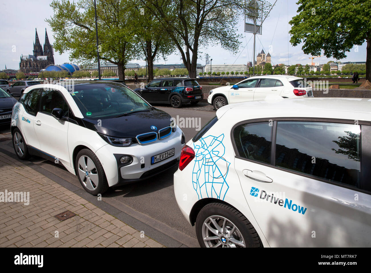cars of the carsharing companies Drive Now and Car2Go in the district Deutz, Cologne, Germany Stock Photo