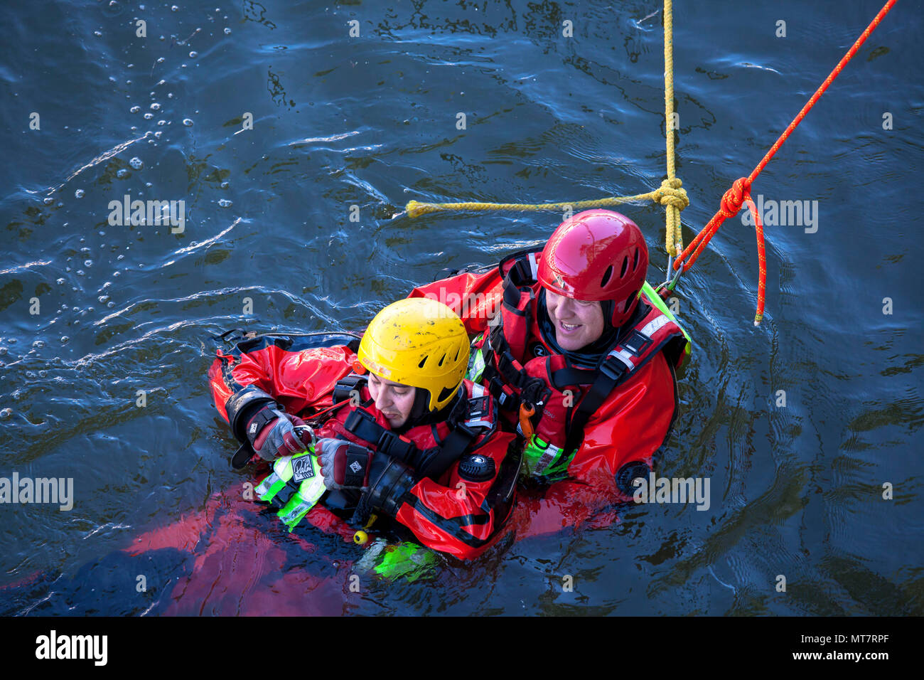Germany, Cologne, firefighters practise the rescue of a drowning man in the Rhine.  Deutschland, Koeln, Feuerwehr uebt die Rettung eines Ertrinkenden  Stock Photo