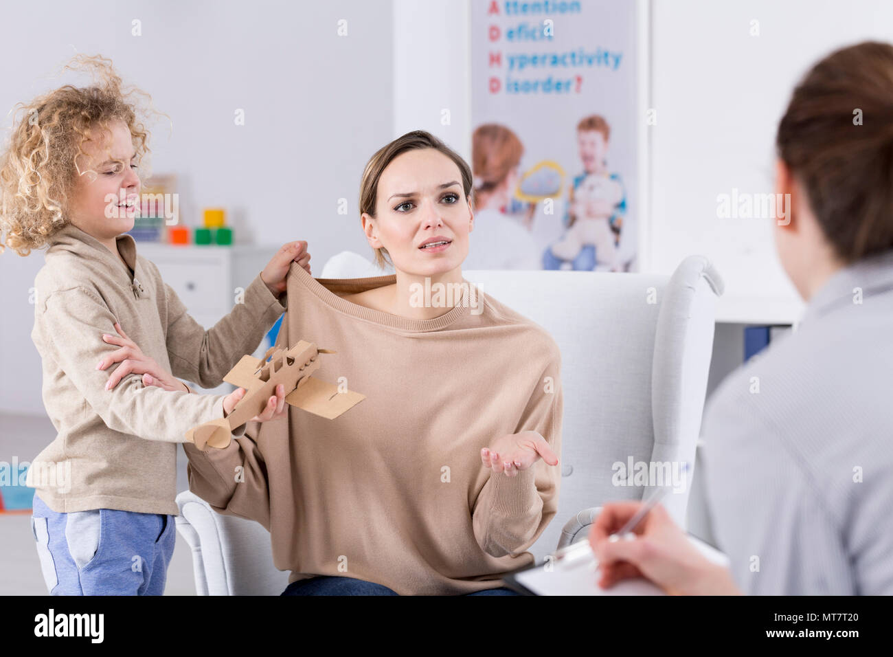 Child having difficulty controlling behavior, worried mother and