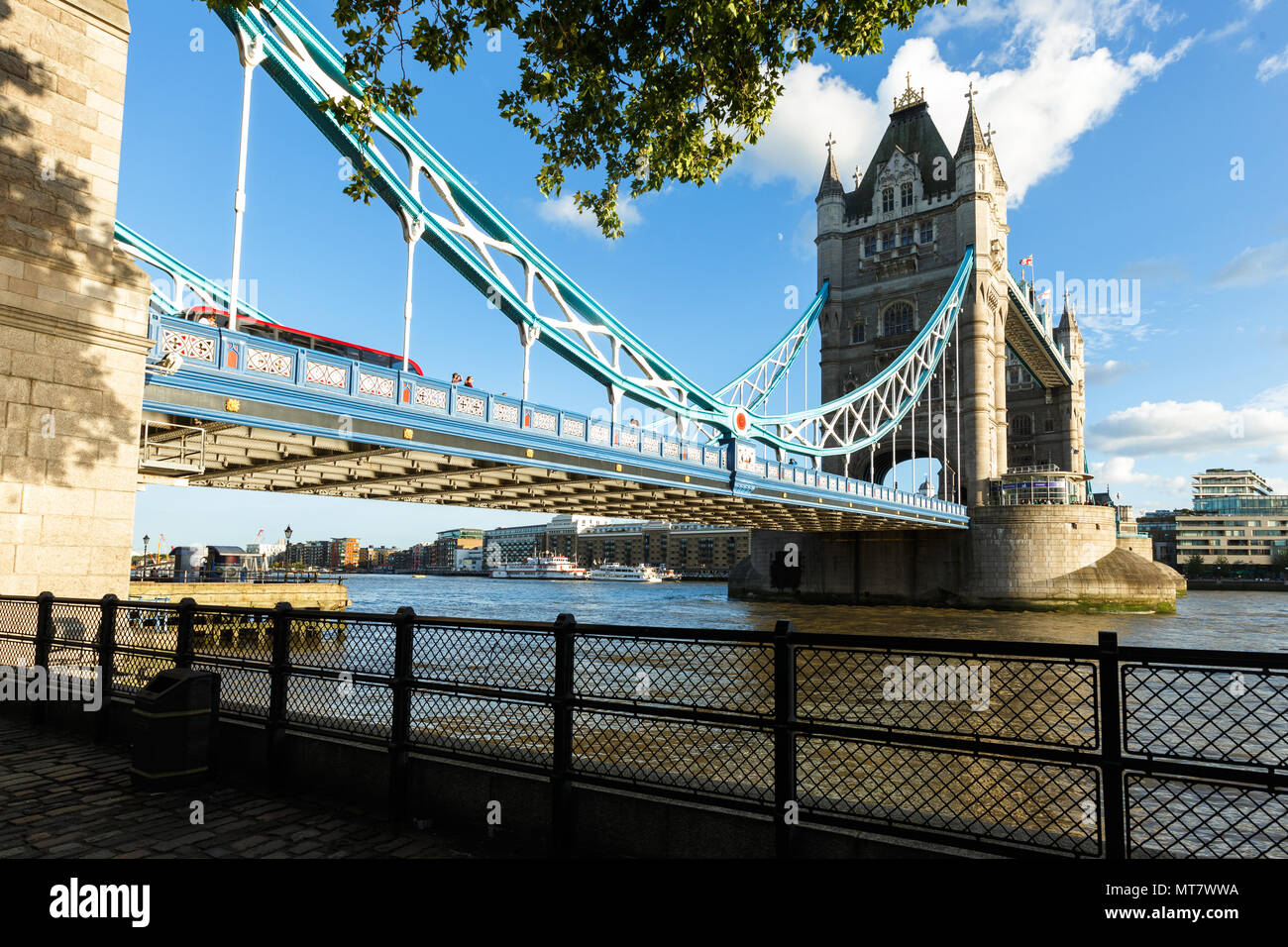 Daylight Establishing Shot London Iconic Landmark Tower Bridge. river transport Stock Photo