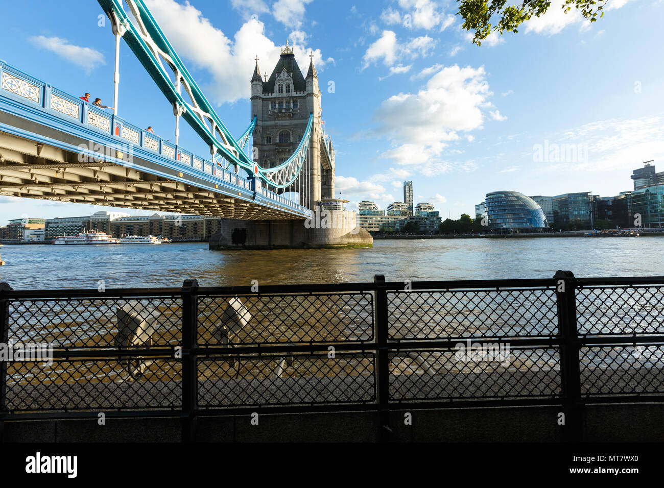 Daylight Establishing Shot London Iconic Landmark Tower Bridge. river transport Stock Photo