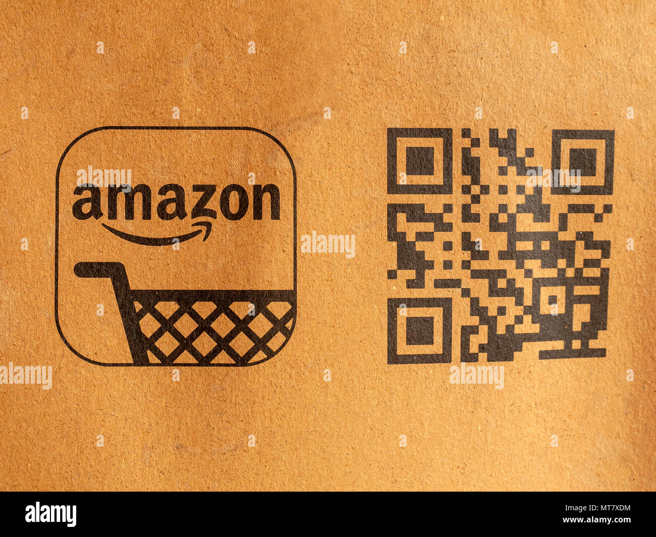 Detail of Amazon parcel showing logo and QR code Stock Photo