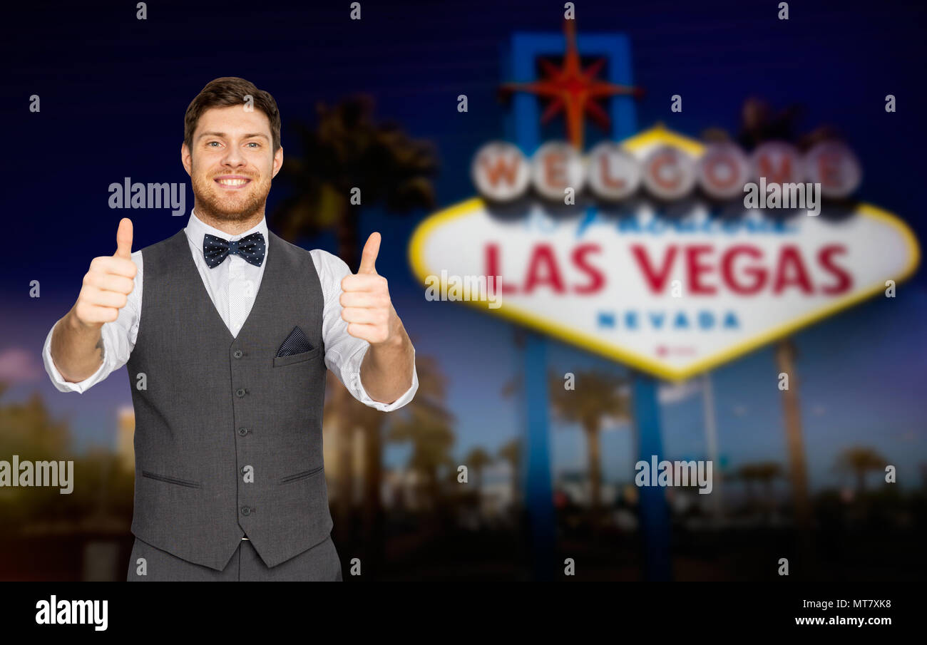 happy man showing thumbs up over las vegas sign Stock Photo Alamy