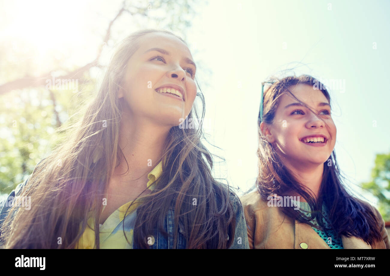 happy teenage student girls or friends outdoors Stock Photo - Alamy