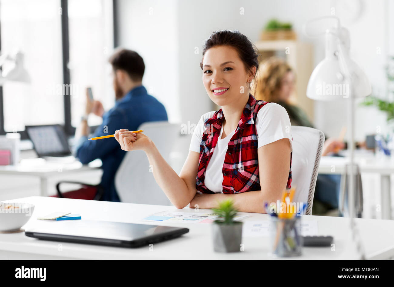 creative woman working on user interface at office Stock Photo