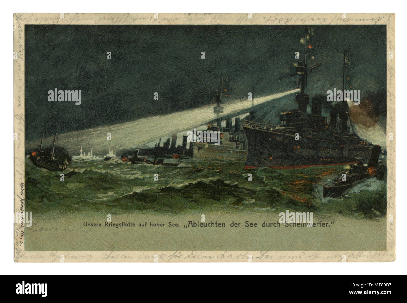 German historical postcard: The Navy lights its way with spotlights in the stormy sea, on a dark night. world war one 1914-1918. Germany. Stock Photo
