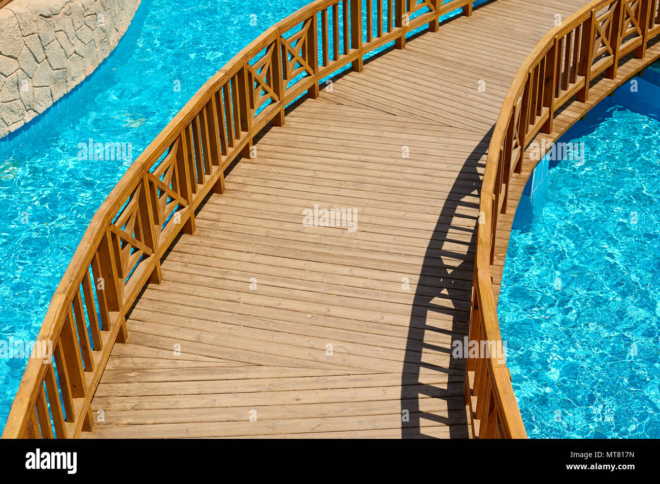 swimming pool with wooden bridge, travel concept in Egypt, Sharm El Sheikh Stock Photo