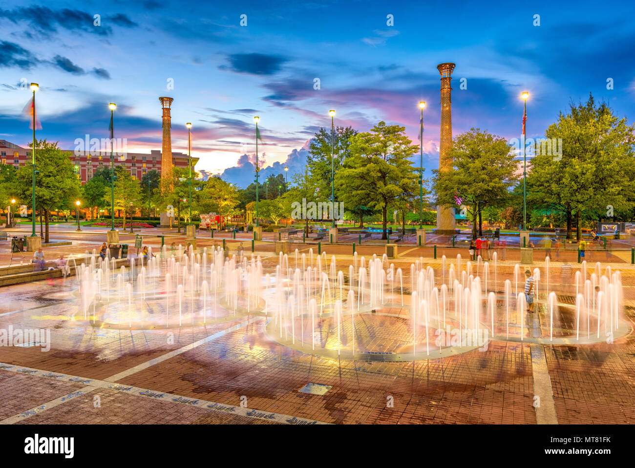 ATLANTA, GEORGIA - AUGUST 21, 2016: Visitors play in Centennial Olympic Park's landmark fountains. The Park was built for the 1996 Summer Olympics and Stock Photo
