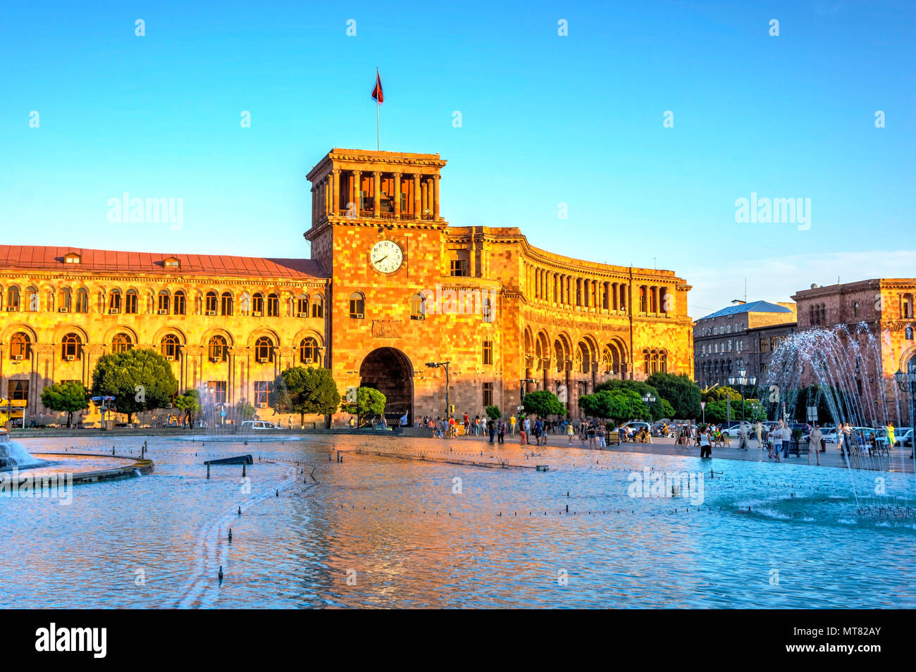 YEREVAN, ARMENIA - AUGUST 2: Republic square with the fountain and clock tower in Armenia capital. August 2017 Stock Photo
