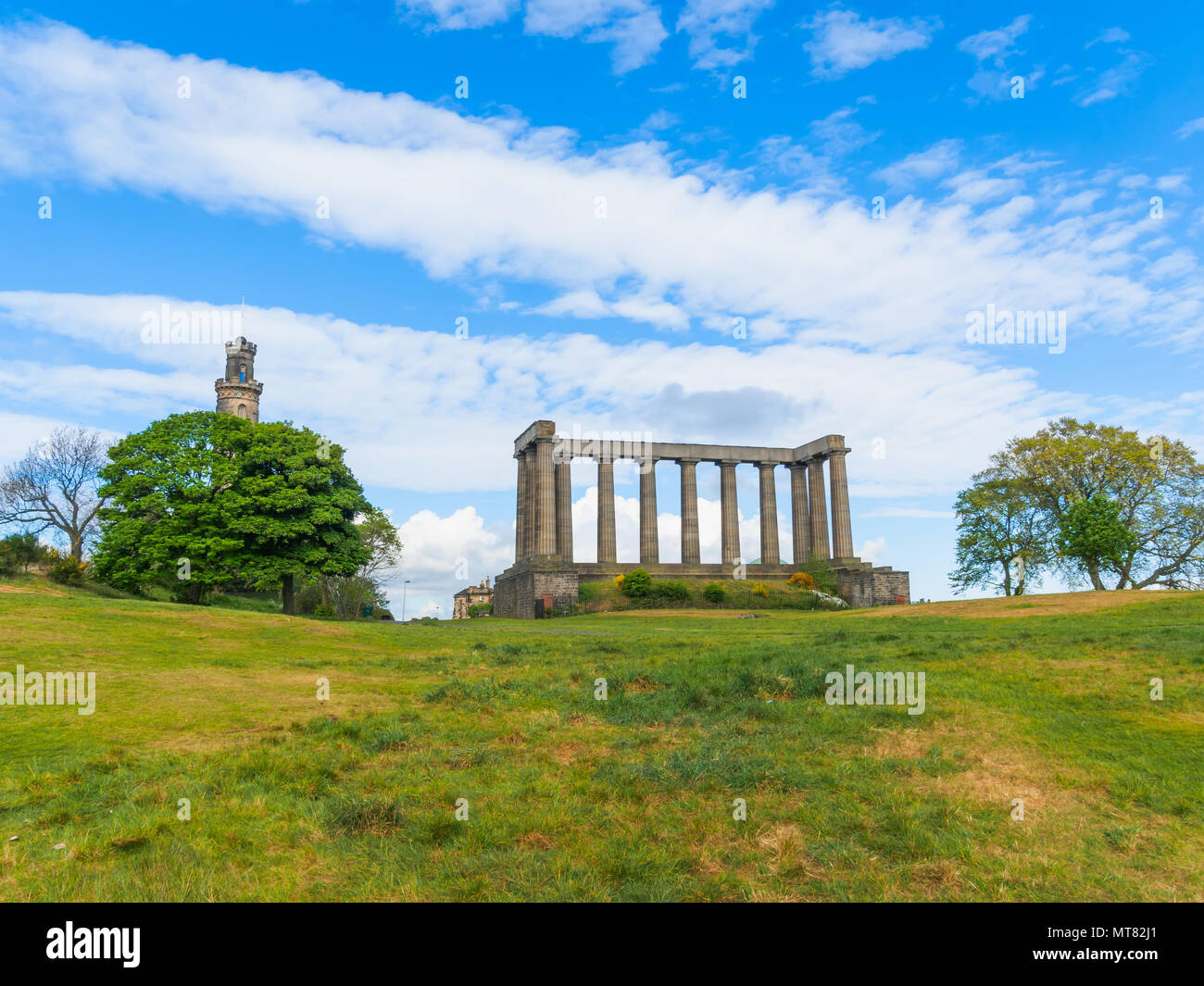 View of the National Monument of Scotland and the Nelson Monument, on Calton Hill in Edinburgh. Stock Photo
