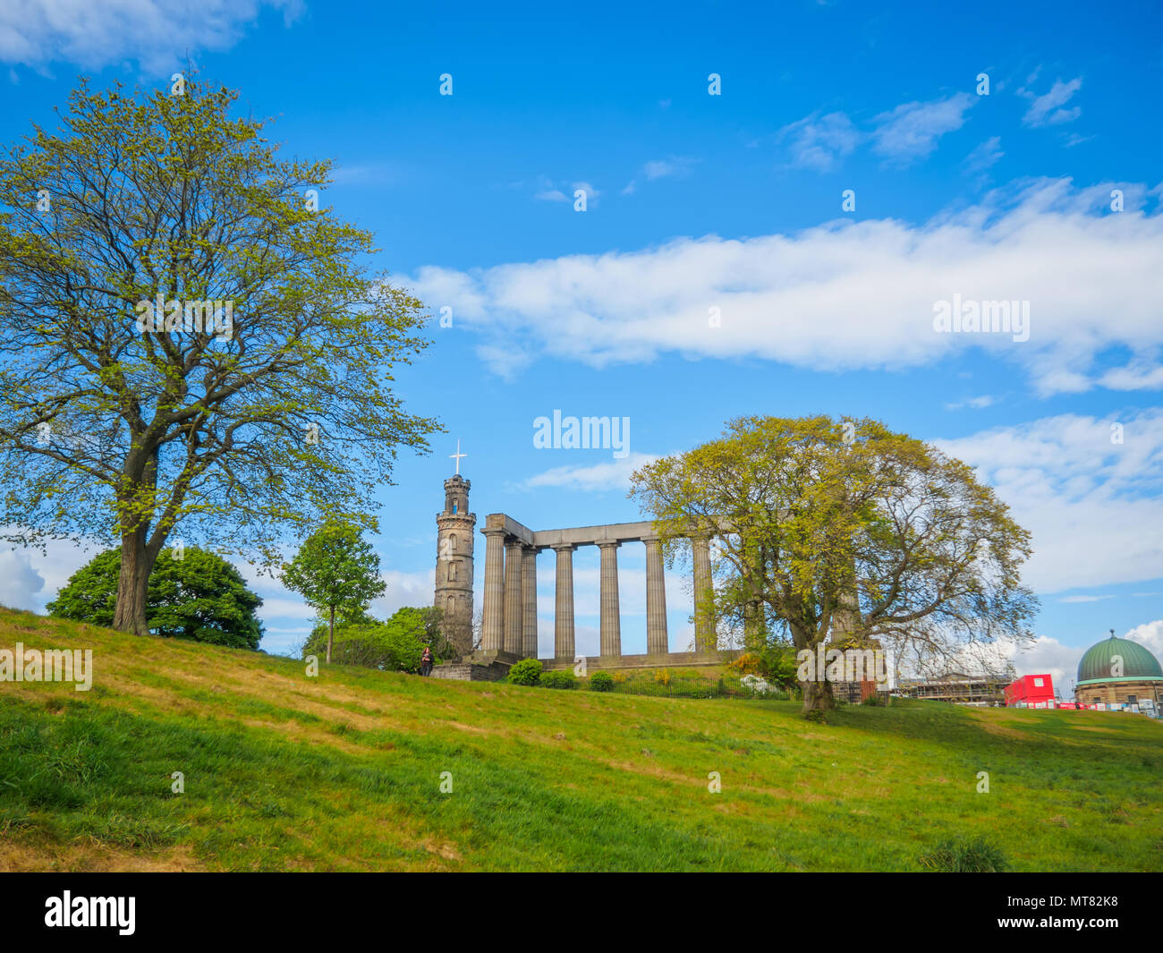 View of the National Monument of Scotland and the Nelson Monument, on Calton Hill in Edinburgh. Stock Photo