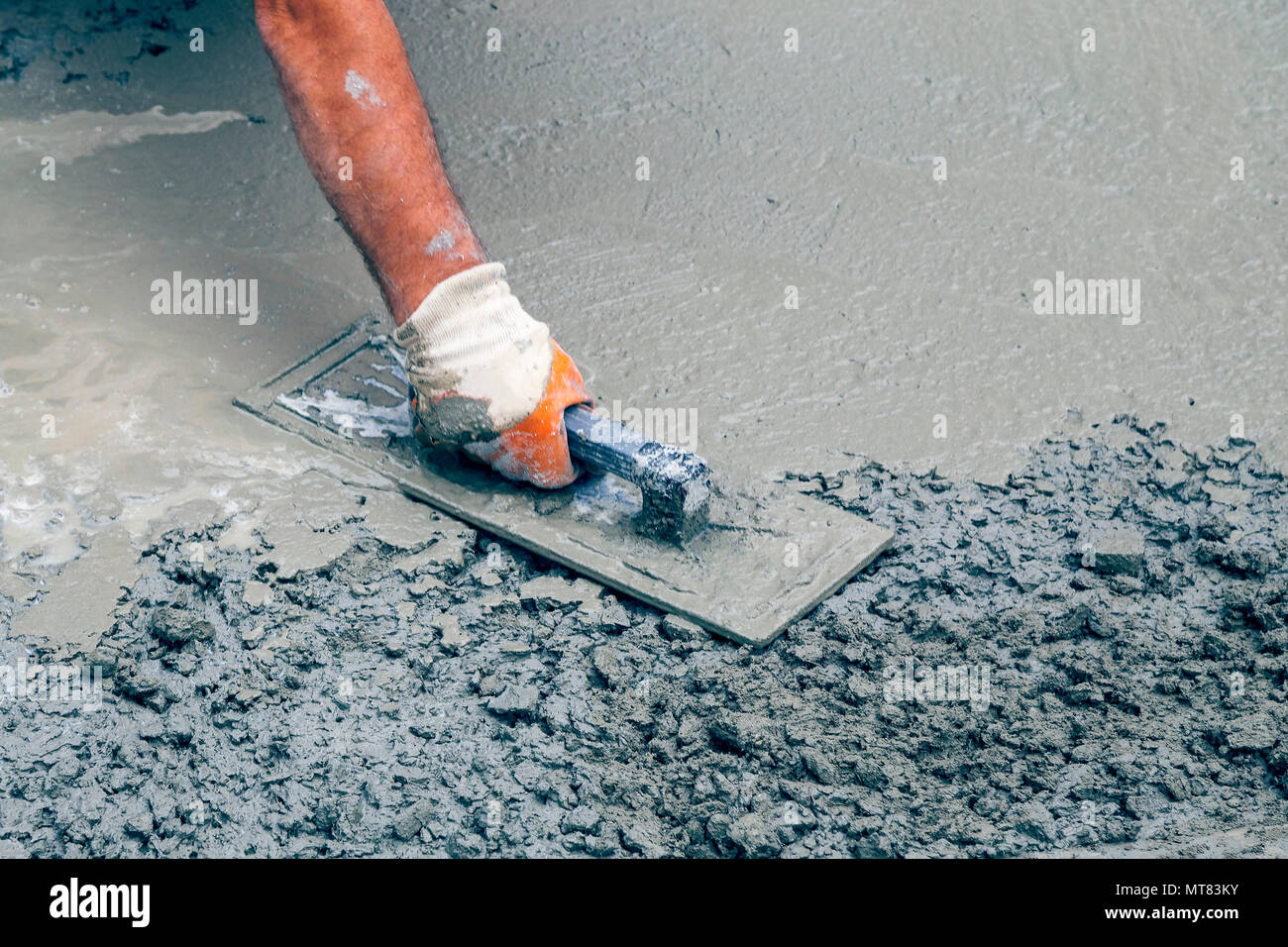 Hand Builder With Trowel Leveling Concrete Spreading Poured Some