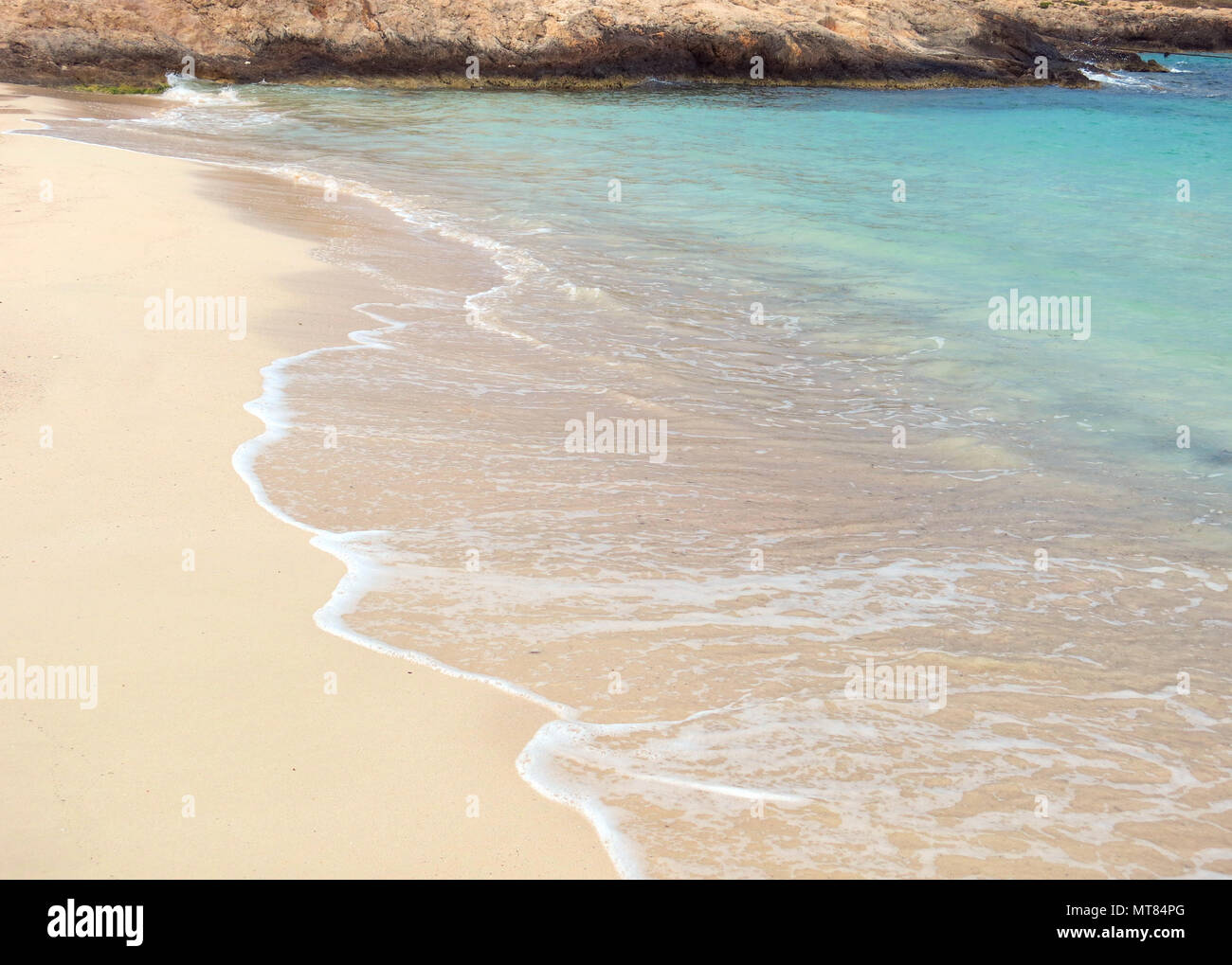 beach with light sand bathed by the clear waters of the Mediterranean Sea on the Sicilian coast Stock Photo