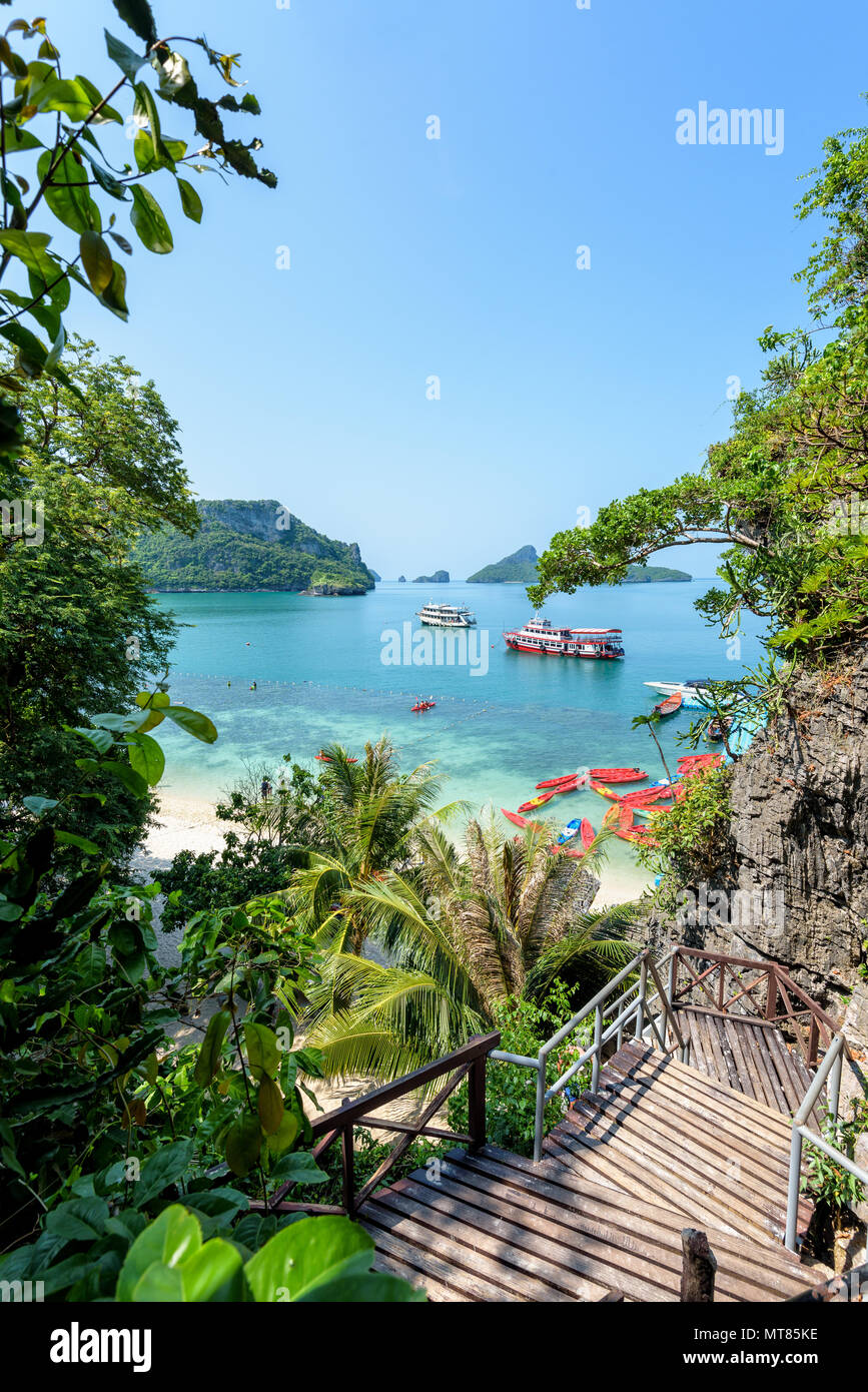 High view beautiful nature landscape of stairs up to the Thale Nai and travel boat on the sea in summer near the beach at Koh Mae Ko island in Mu Ko A Stock Photo