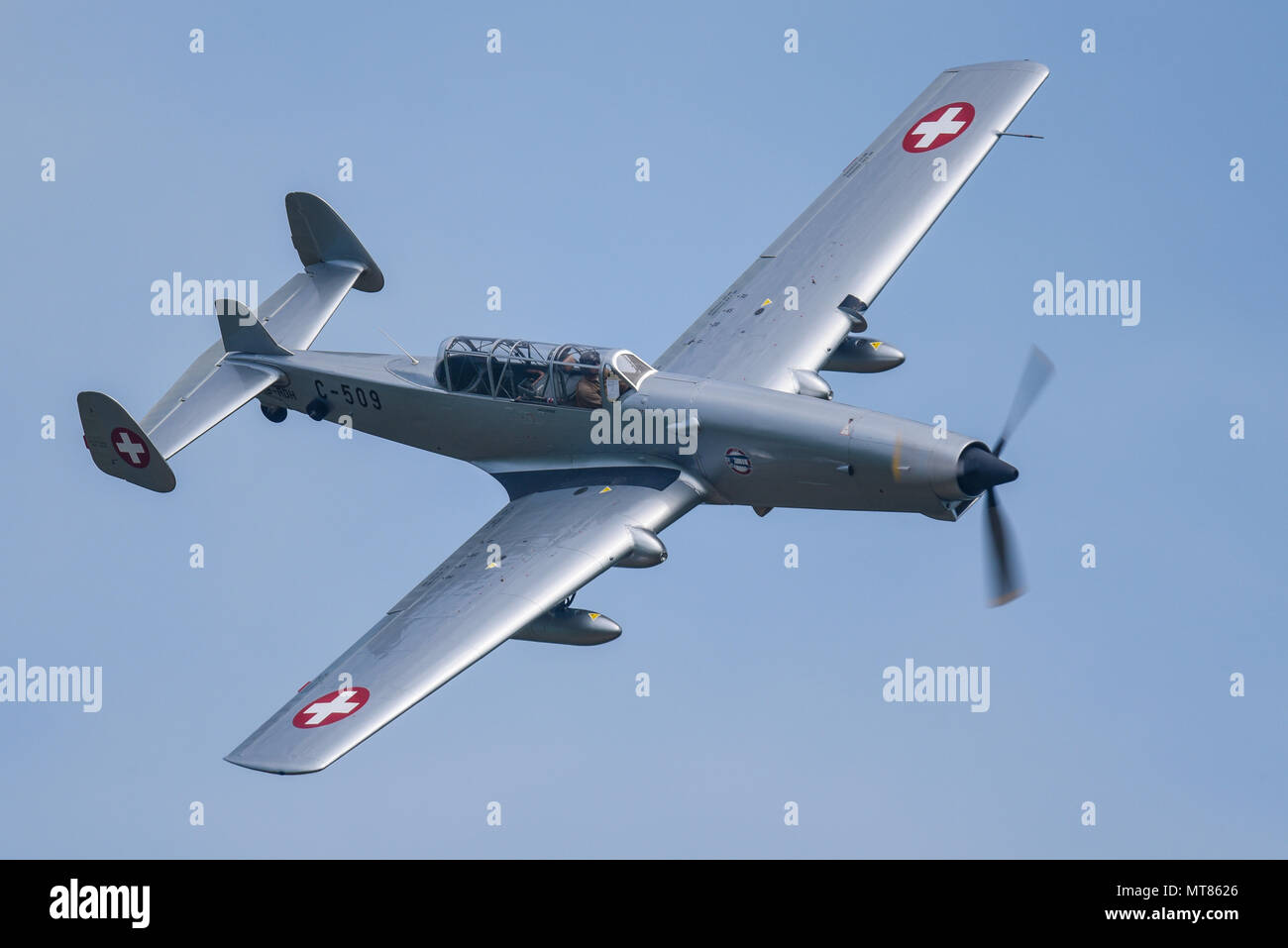 Farner Werke F+W C-3605, nicknamed Schlepp ('Tug') or 'Alpine Anteater' flying at an airshow in blue sky. ex Swiss Air Force Operated by 46 Aviation Stock Photo