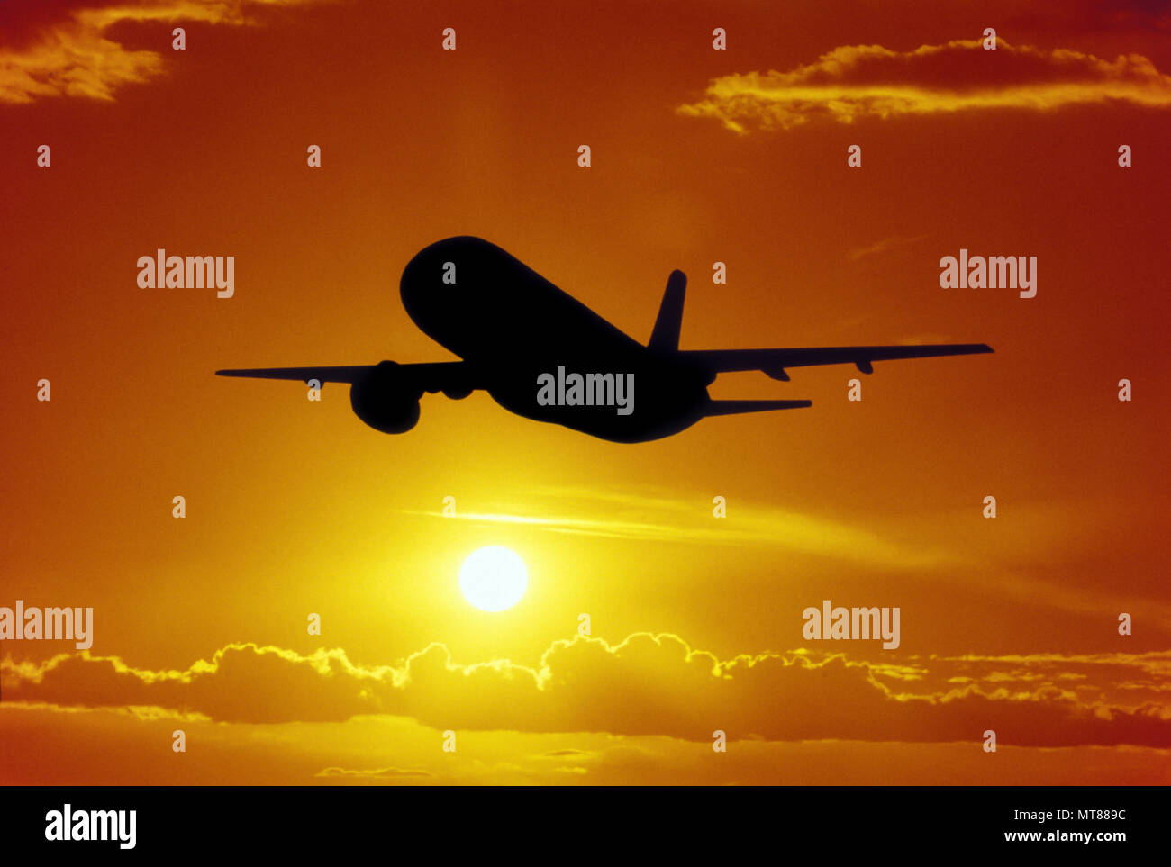 1990 HISTORICAL SILHOUETTE OF AIRBORNE COMMERCIAL AIRLINER Stock Photo ...