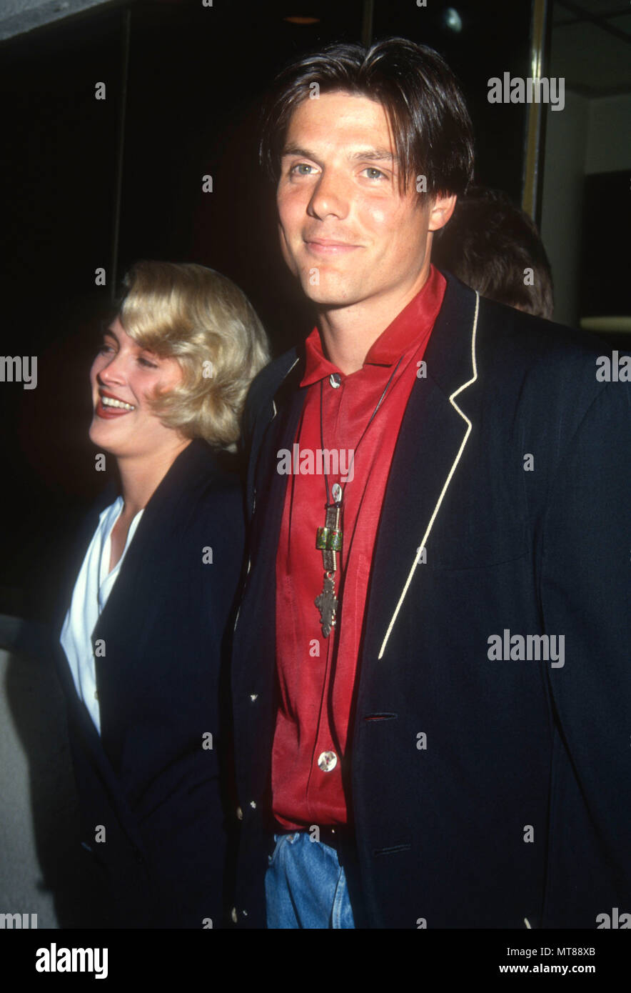 LOS ANGELES, CA MAY 23 Actor Paul Johansson (R) and guest attend the