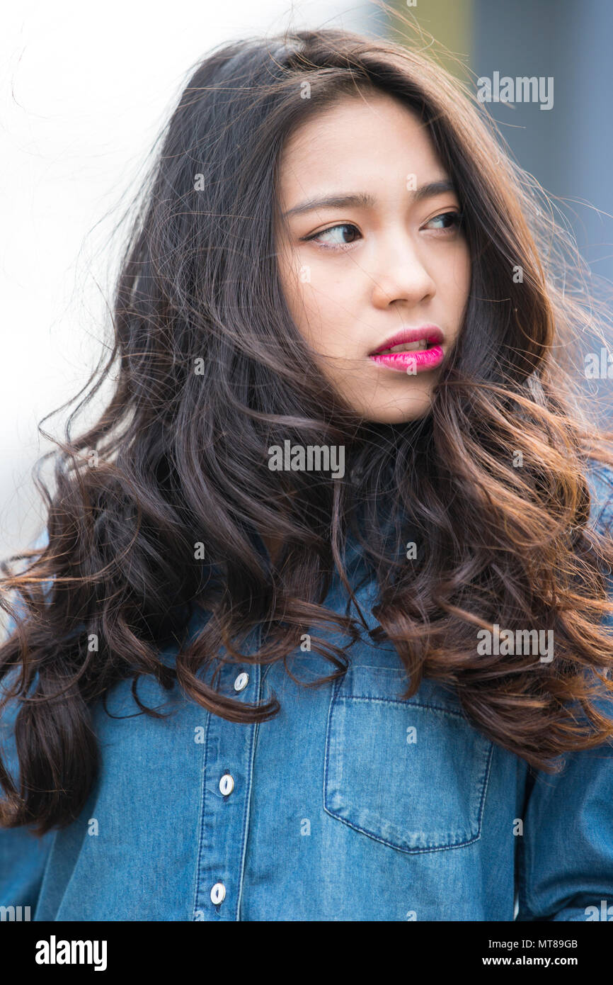 Picture of One beautiful young Chinese woman outdoor in the street